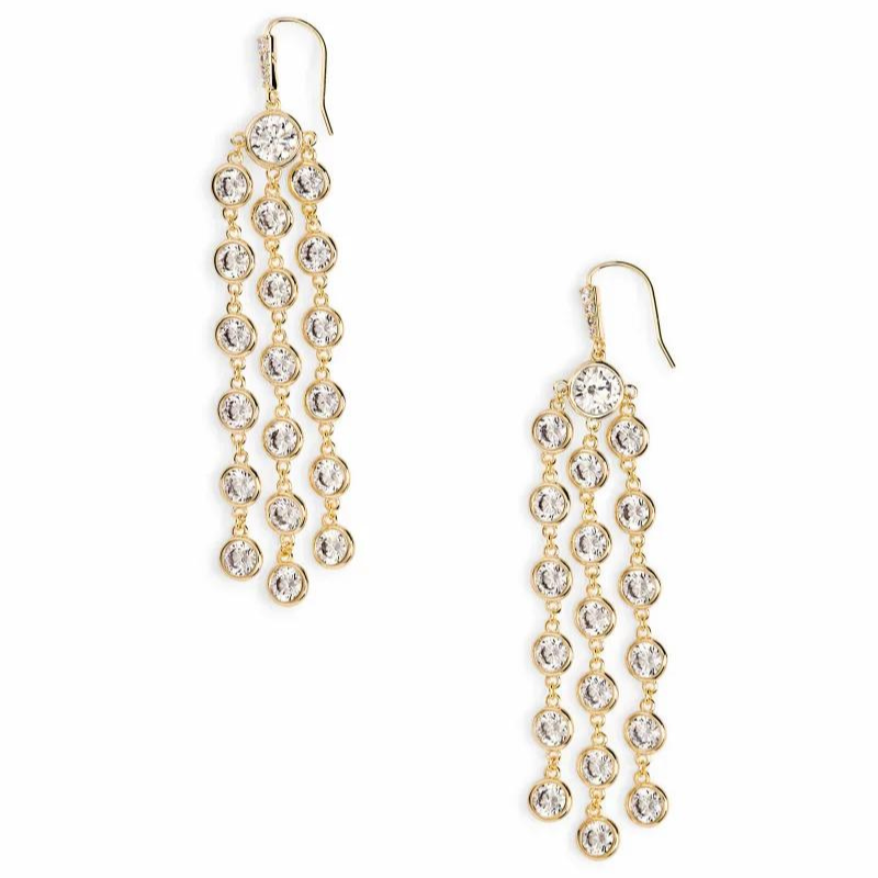 Gold dangle earrings with circle white crystal stones in a waterfall shape , pictured on a white background.
