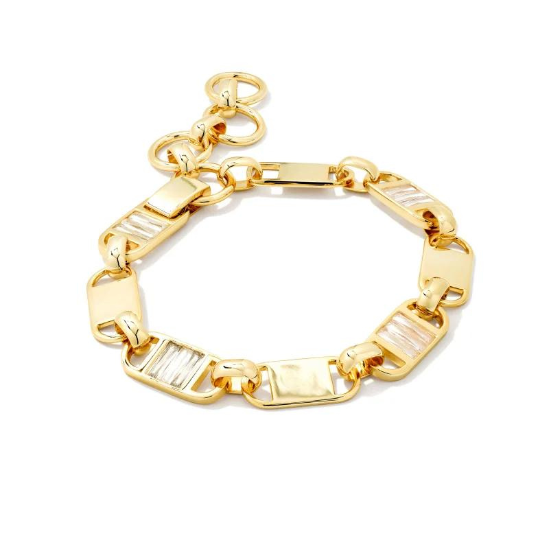 Gold chain link bracelet with white crystals, pictured on a white background.