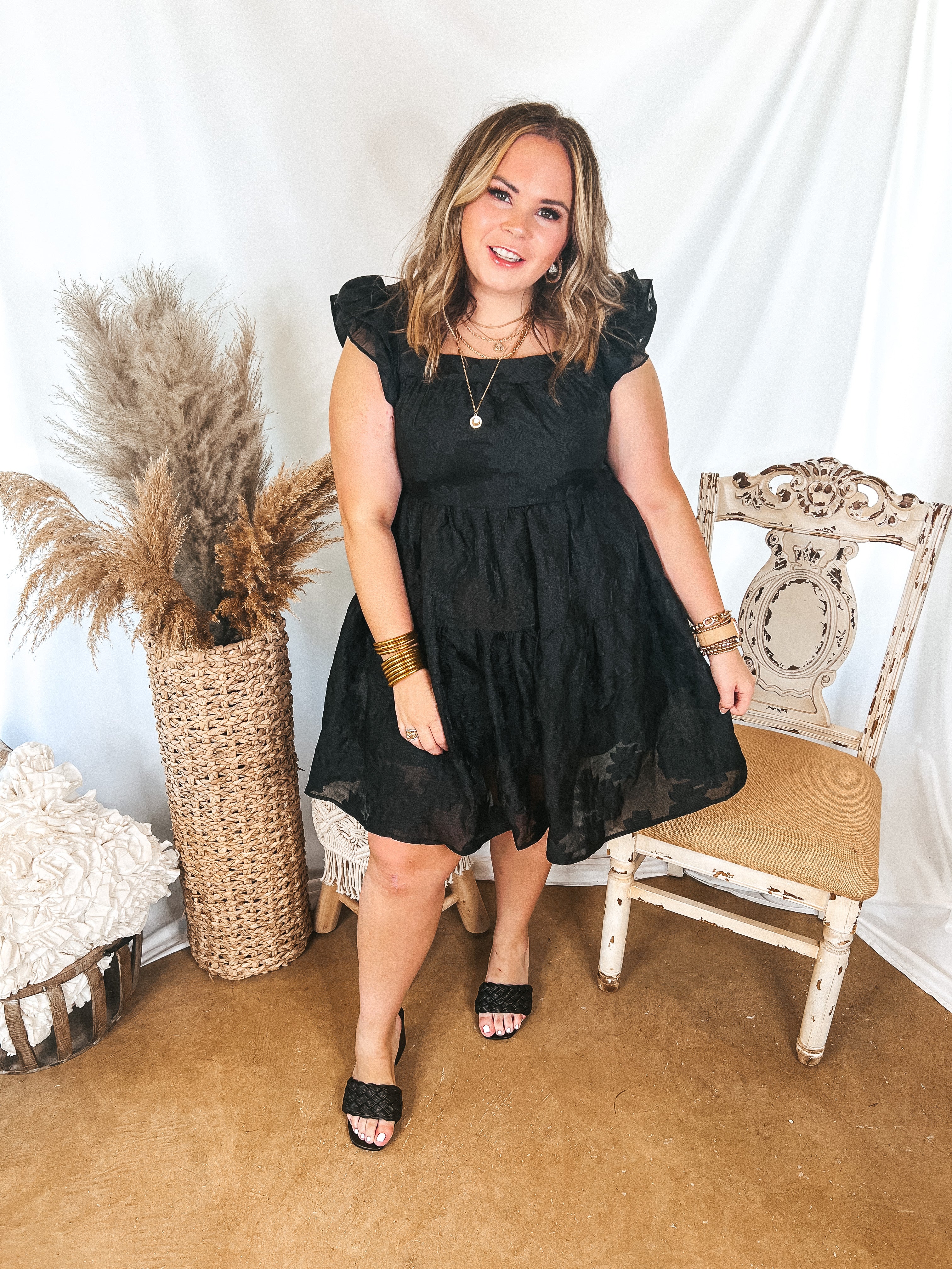 Sweet On Me Floral Embossed Dress with Ruffle Cap Sleeves in Black - Giddy Up Glamour Boutique