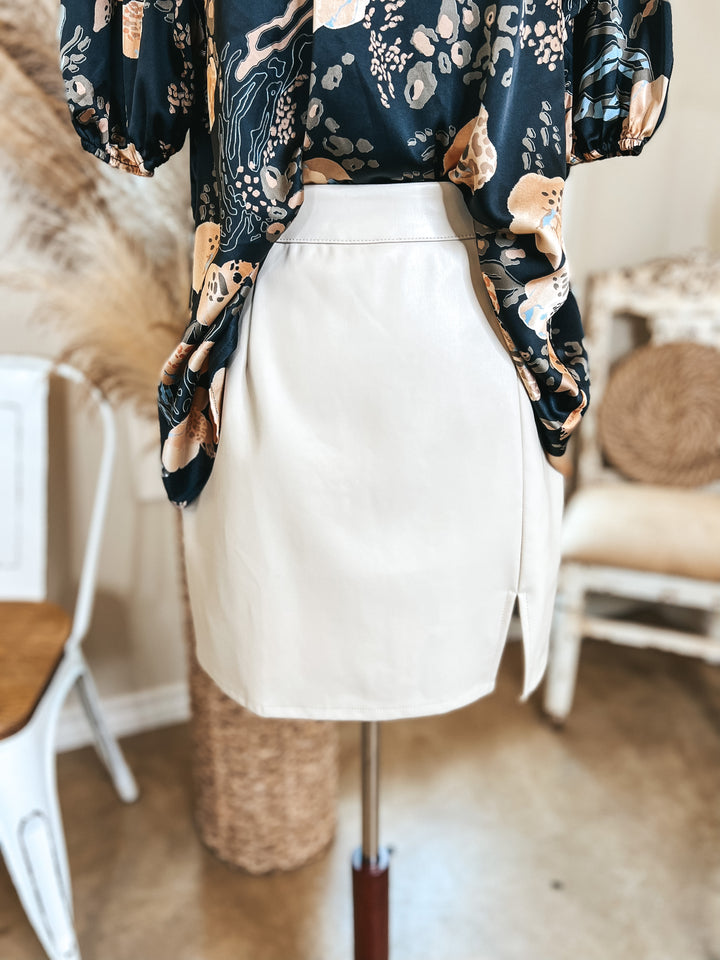 All the Buzz Faux Leather Side Slit Mini Skirt in Cream - Giddy Up Glamour Boutique