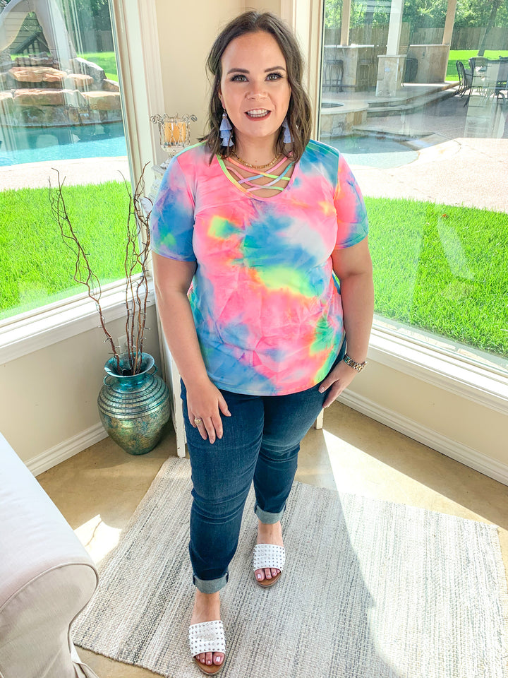 Last Chance Size Small & 3XL | Over the Rainbow Short Sleeve Tie Dye Top with Criss Cross Neck in Yellow, Pink, and Blue - Giddy Up Glamour Boutique