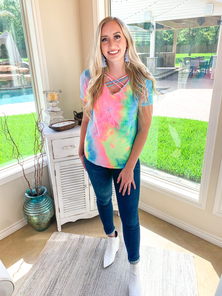 Last Chance Size Small & 3XL | Over the Rainbow Short Sleeve Tie Dye Top with Criss Cross Neck in Yellow, Pink, and Blue - Giddy Up Glamour Boutique