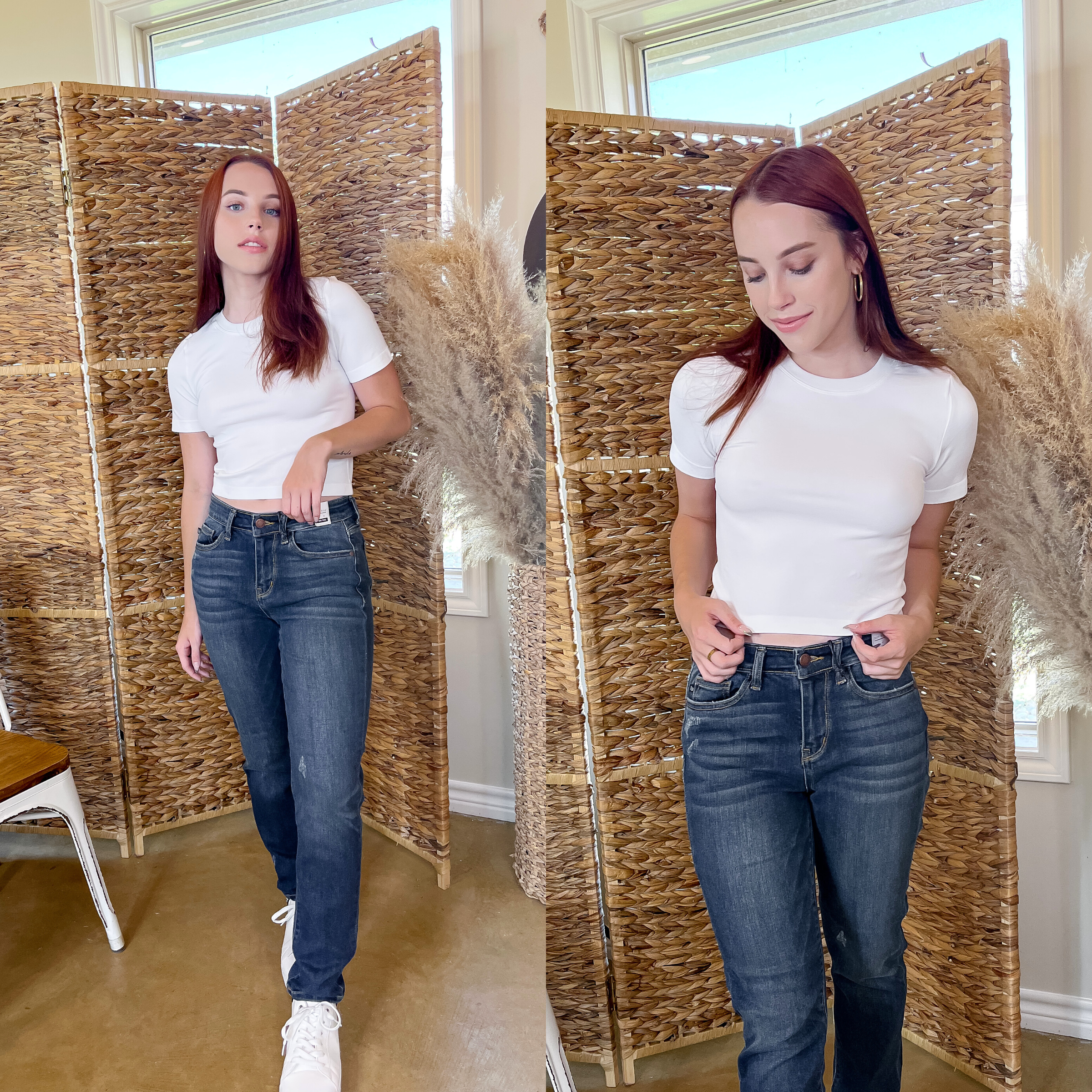 Model is wearing a white, high neck cropped short sleeve top with  dark blue jeans. She is also wearing gold hoops and white tennis shoes.