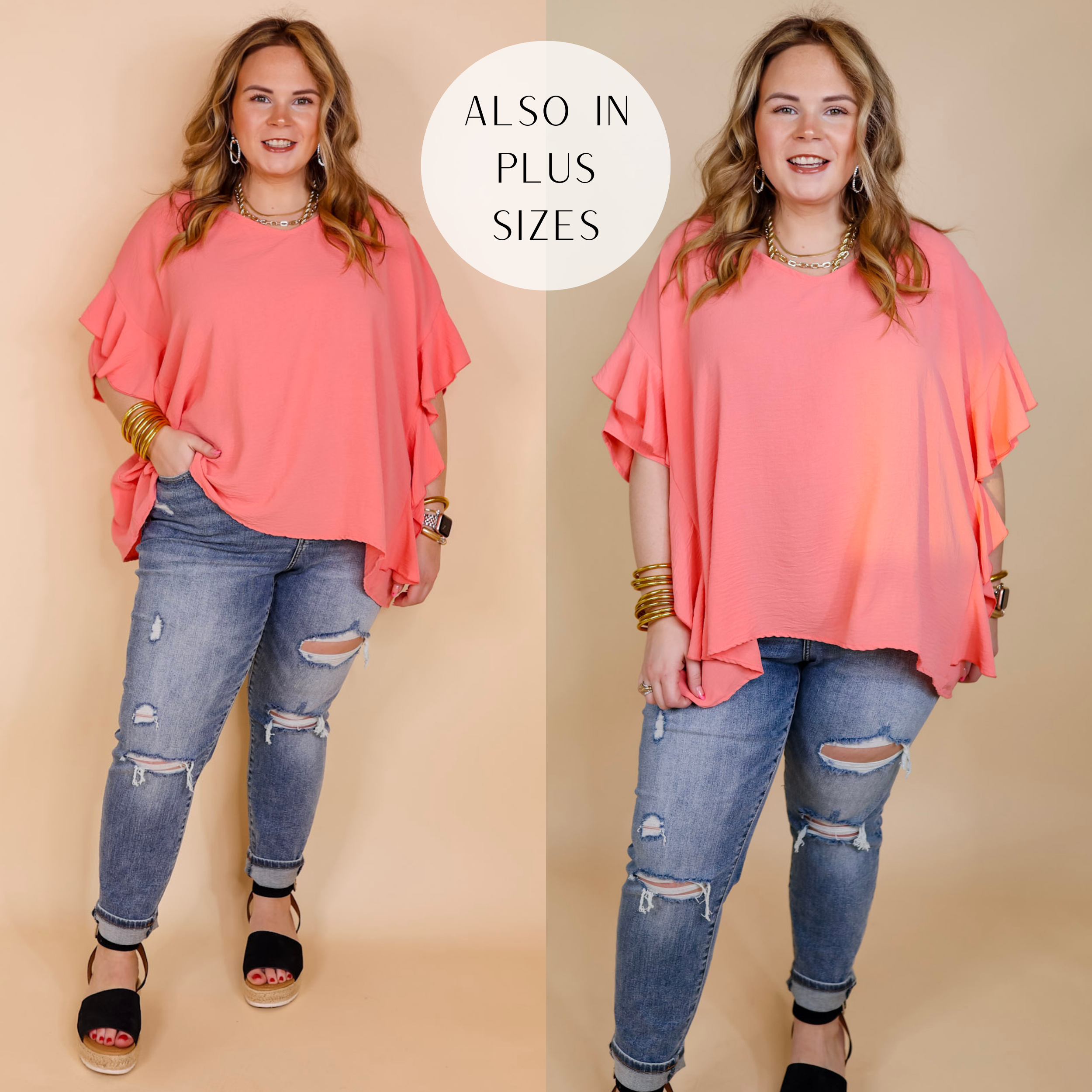 Model is wearing a coral pink poncho top with ruffle sleeves and ruffles down the side. Model has it paired with distressed skinny jeans, black sandals, and gold jewelry.
