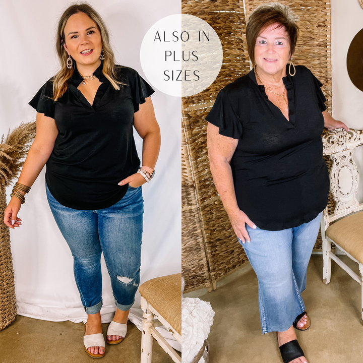 Model is wearing a black ruffle sleeve top with a notched neckline. Model has it paired with cuffed denim jeans, white sandals, and gold jewelry.