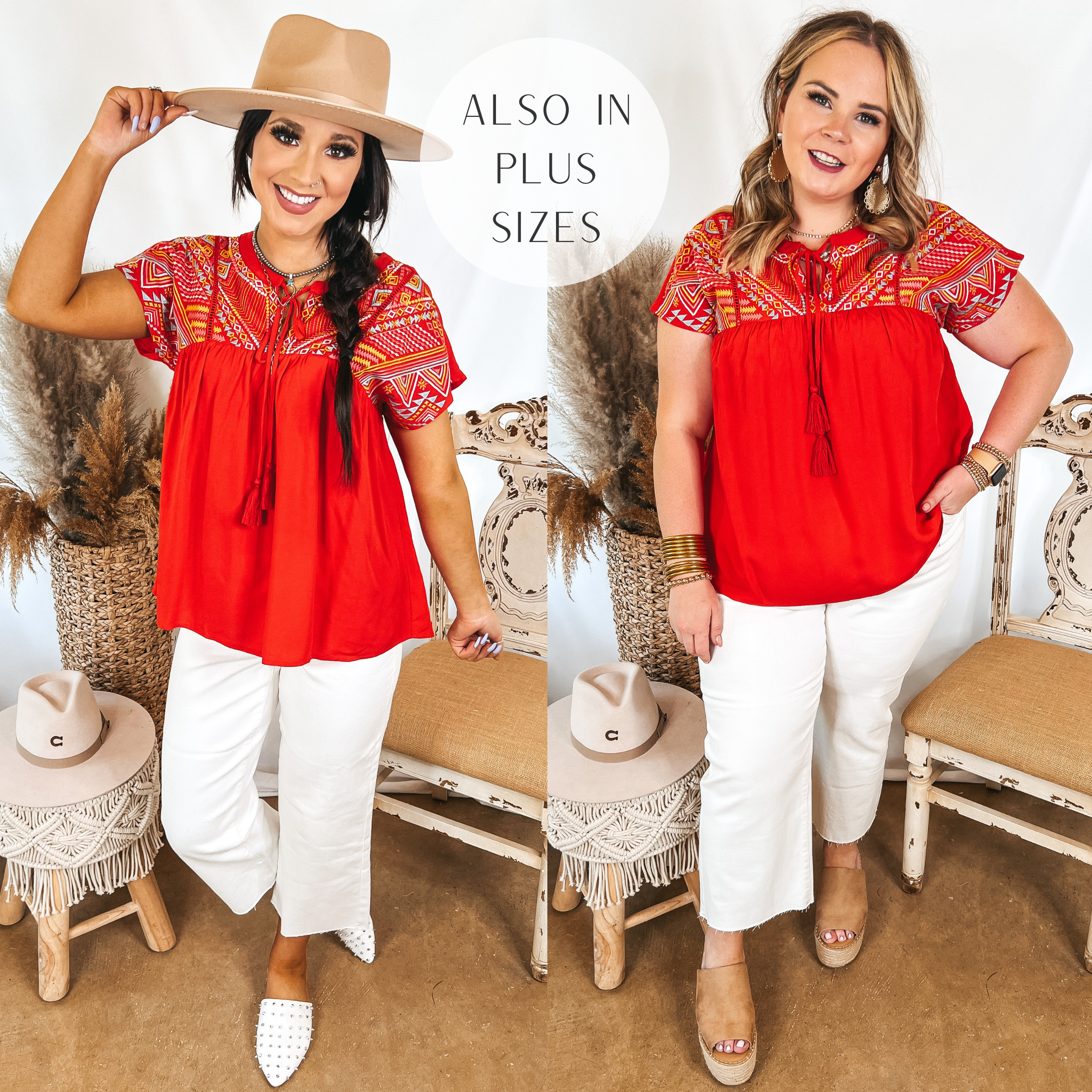 Models are wearing a red short sleeve top that has embroidery on the upper. Both models have it paired with white cropped jeans. Size small model has it paired with white mules, silver jewelry, and a tan hat. Size large model has it paired with tan wedges and gold jewelry.