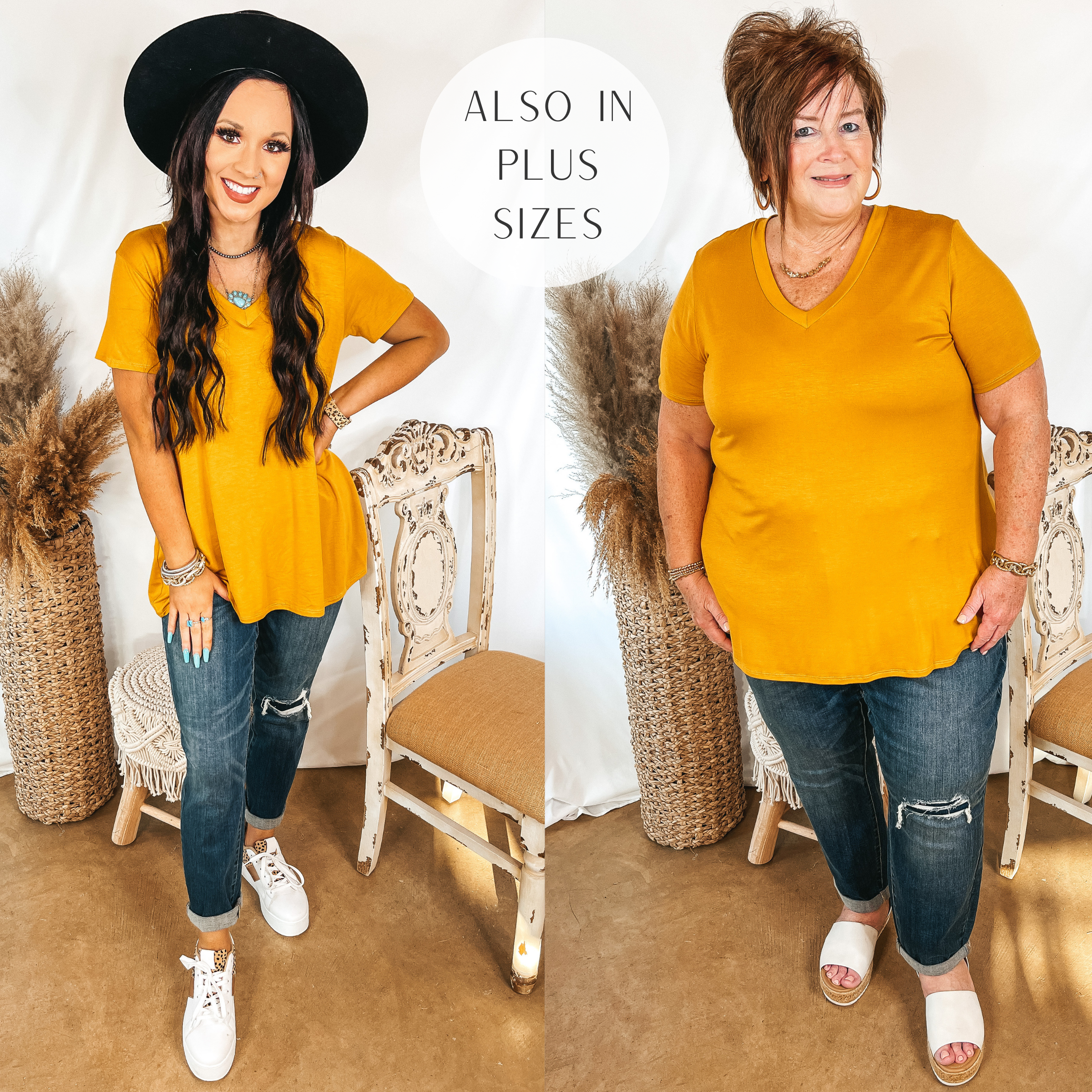 Models are wearing a mustard yellow v neck top. Size small model has it paired with medium wash boyfriend jeans, white sneakers, and a black hat. Plus size model has it paired with medium wash boyfriend jeans, white sandals, and gold jewelry.