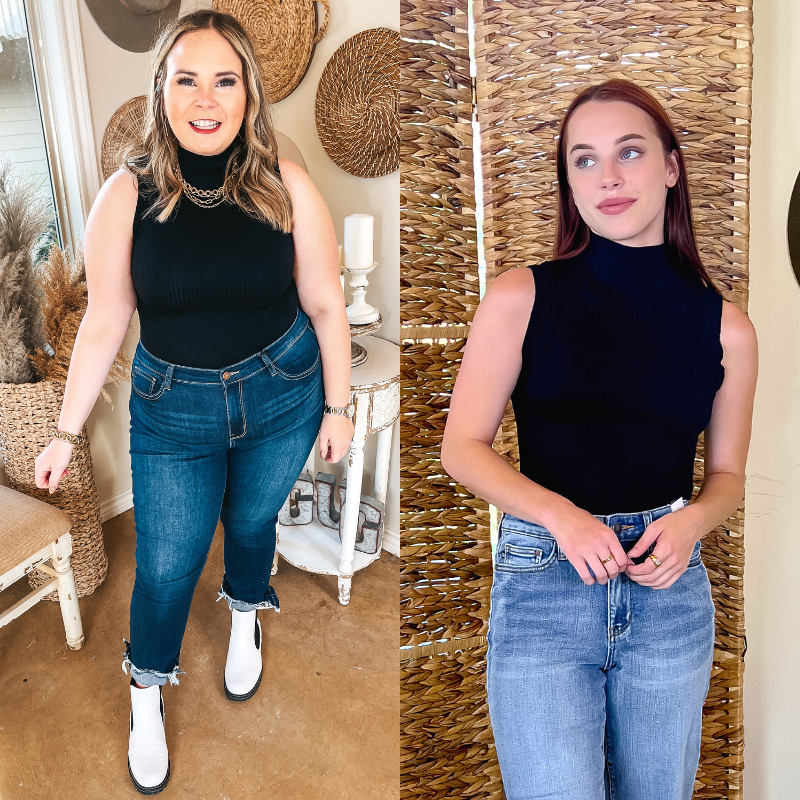 Both models are wearing a black, ribbed, turtleneck, tank top bodysuit. Model on the left is wearing dark wash skinny jeans with a rolled up raw hem with white booties, and gold necklaces and bracelet. Model on the right is wearing light wash jeans and gold rings.