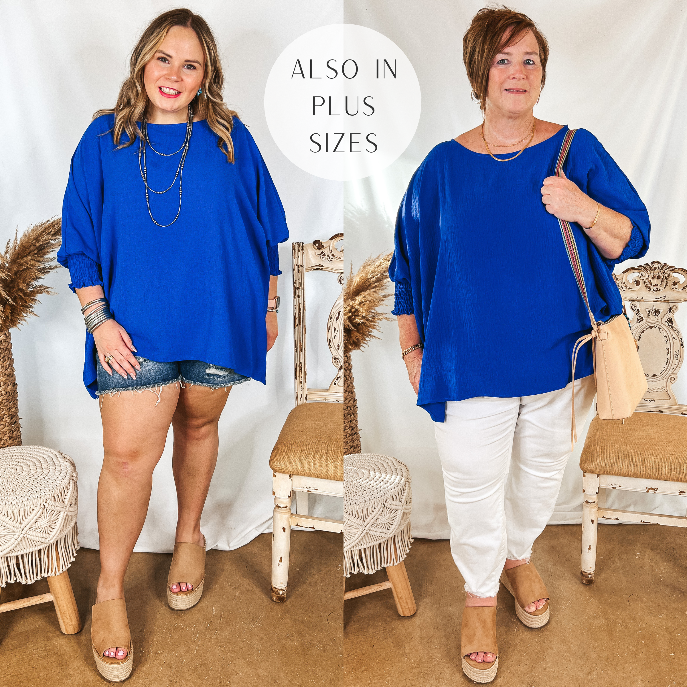 Models are wearing a royal blue oversized top with 3/4 sleeves. Size large model has it paired with denim shorts, tan wedges, and silver jewelry. Plus size model has it paired with white skinny jeans, tan wedges, and gold jewelry.