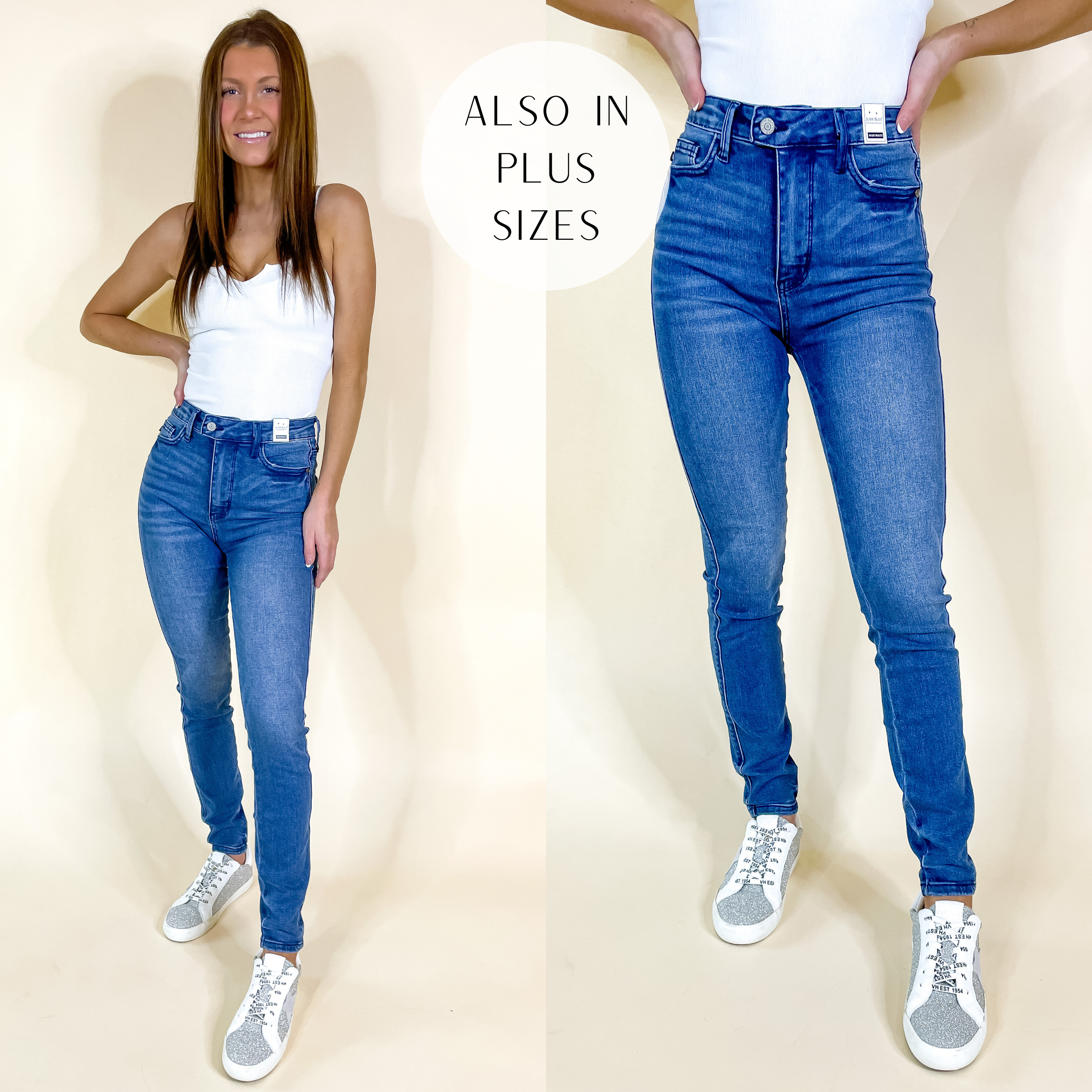 Model is wearing a pair of cool-medium wash skinny jeans. Model has these jeans paired with a white tank top and white sneakers.