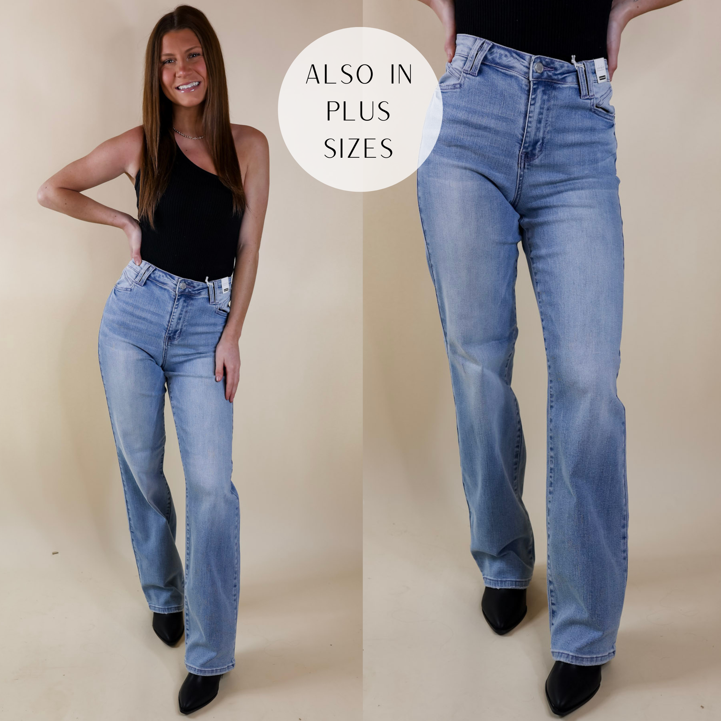 Model is wearing a pair of wide leg light wash jeans. Model has it paired with a black tank top and black boots.