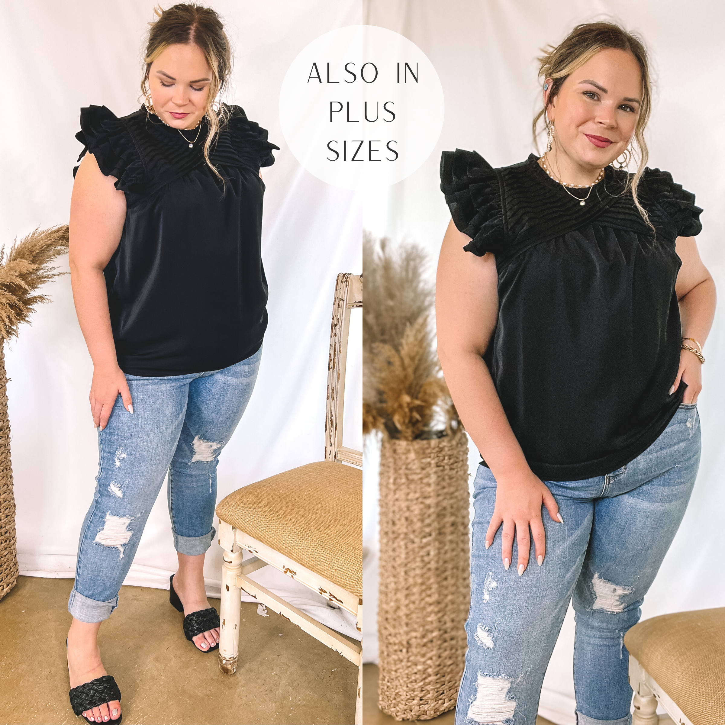 Model is wearing a black ruffle cap sleeve blouse with pleated detailing. Model has it paired with distressed jeans, black heels, and gold jewelry.