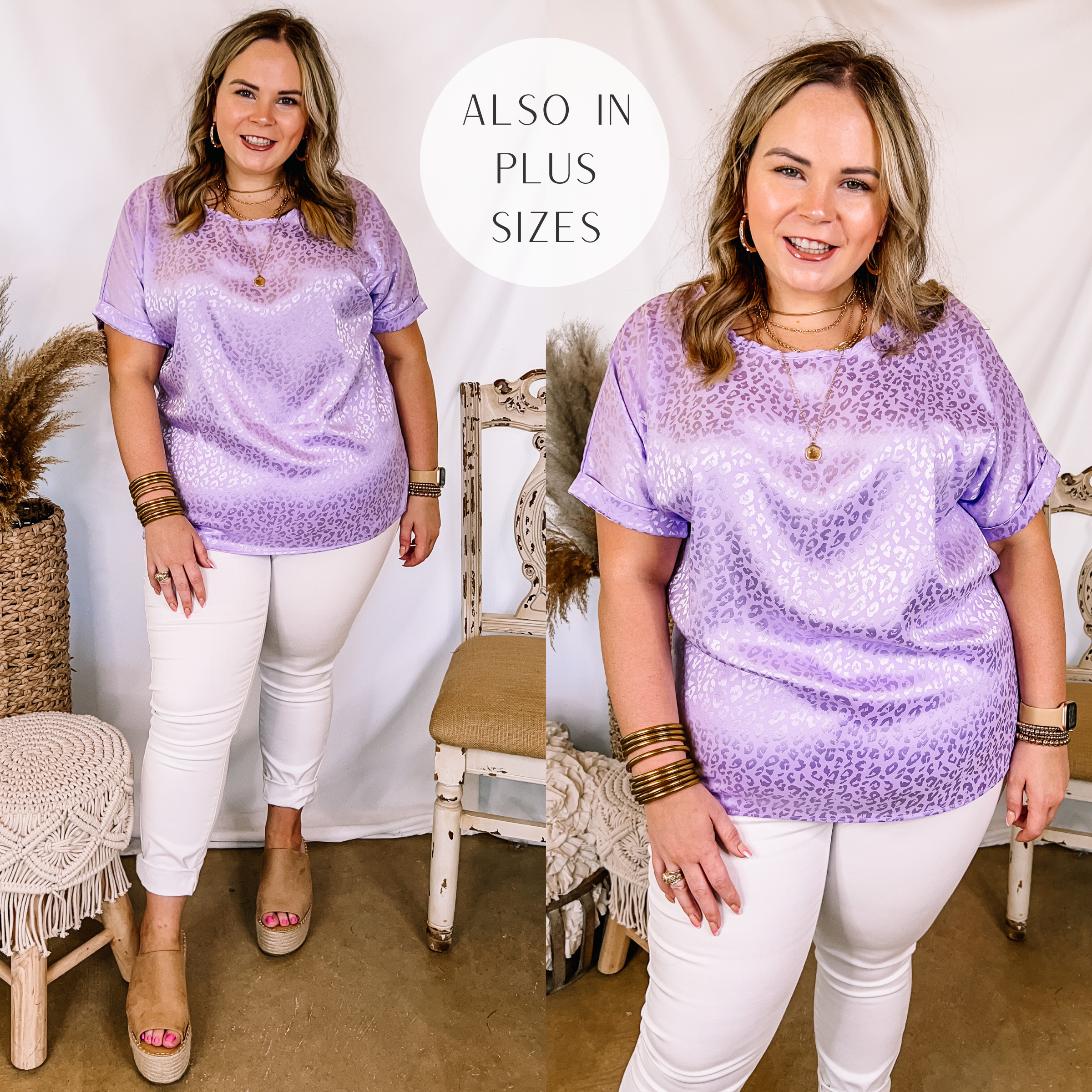 Model is wearing a purple satin top with a shiny leopard print. Model has this short sleeve top paired with white skinny jeans, tan wedges, and gold jewelry.
