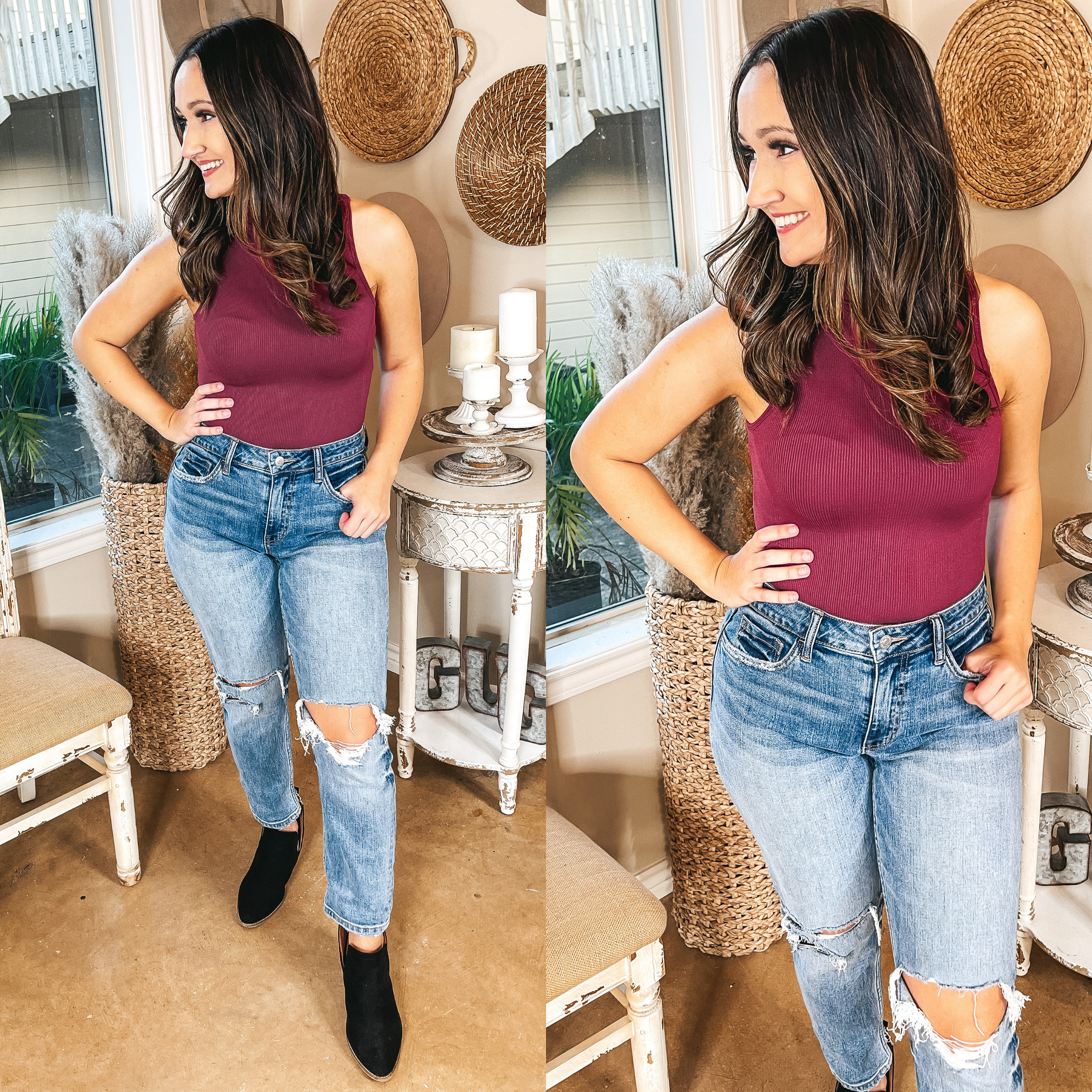Model is wearing a mock turtle neck tank top bodysuit. Model has it paired with distressed light wash jeans, black booties, and gold jewelry.