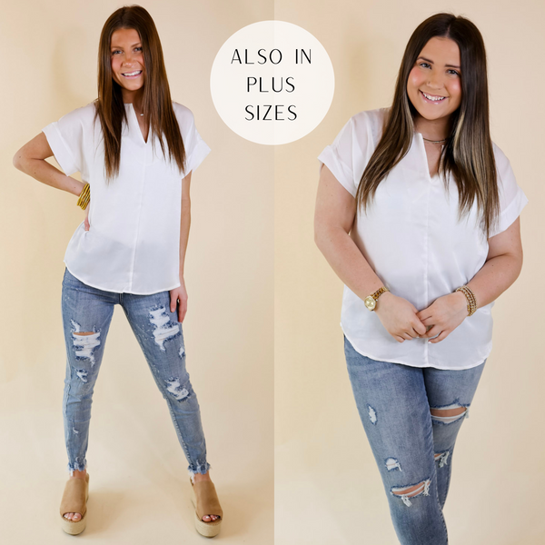 Models are wearing a white short sleeve top with a seem down the front and a notched v neckline. Size small model has it paired with distressed skinny jeans, tan wedges, and gold jewelry. Size large model has it paired with gold jewelry, distressed jeans, and tan wedges.