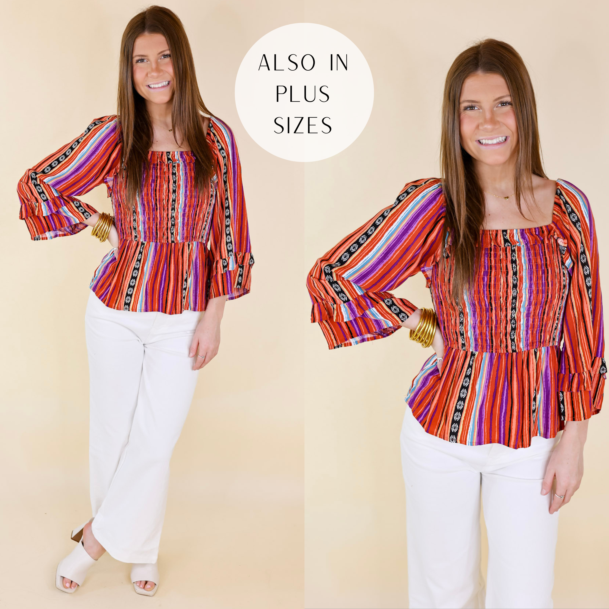 Model is wearing a serape print peplum top with a smocked bodice and 3/4 sleeves. Model has it paired with white heels, white jeans, and gold jewelry.