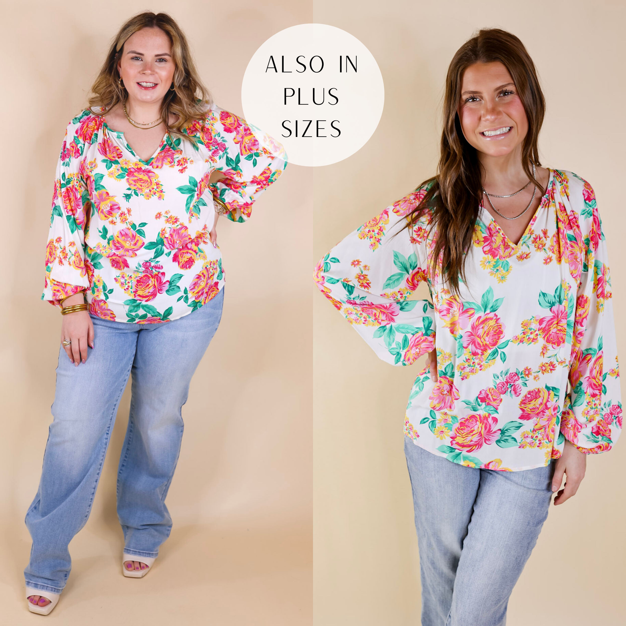 Models are wearing a long sleeve white top with a notched v neckline and a pink, green, and yellow floral print. SIze large model has it paired with wide leg jeans, white heels, and gold jewelry. Size small model has it paired with wide leg jeans and silver jewelry.