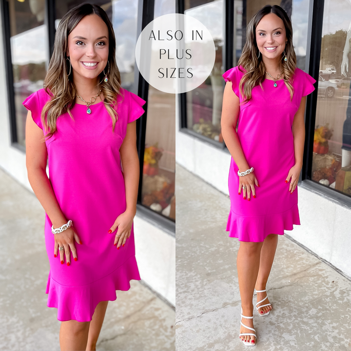 Model is wearing a pink dress with ruffle cap sleeves and a ruffle hemline. Model has it paired with white heels and gold jewelry.