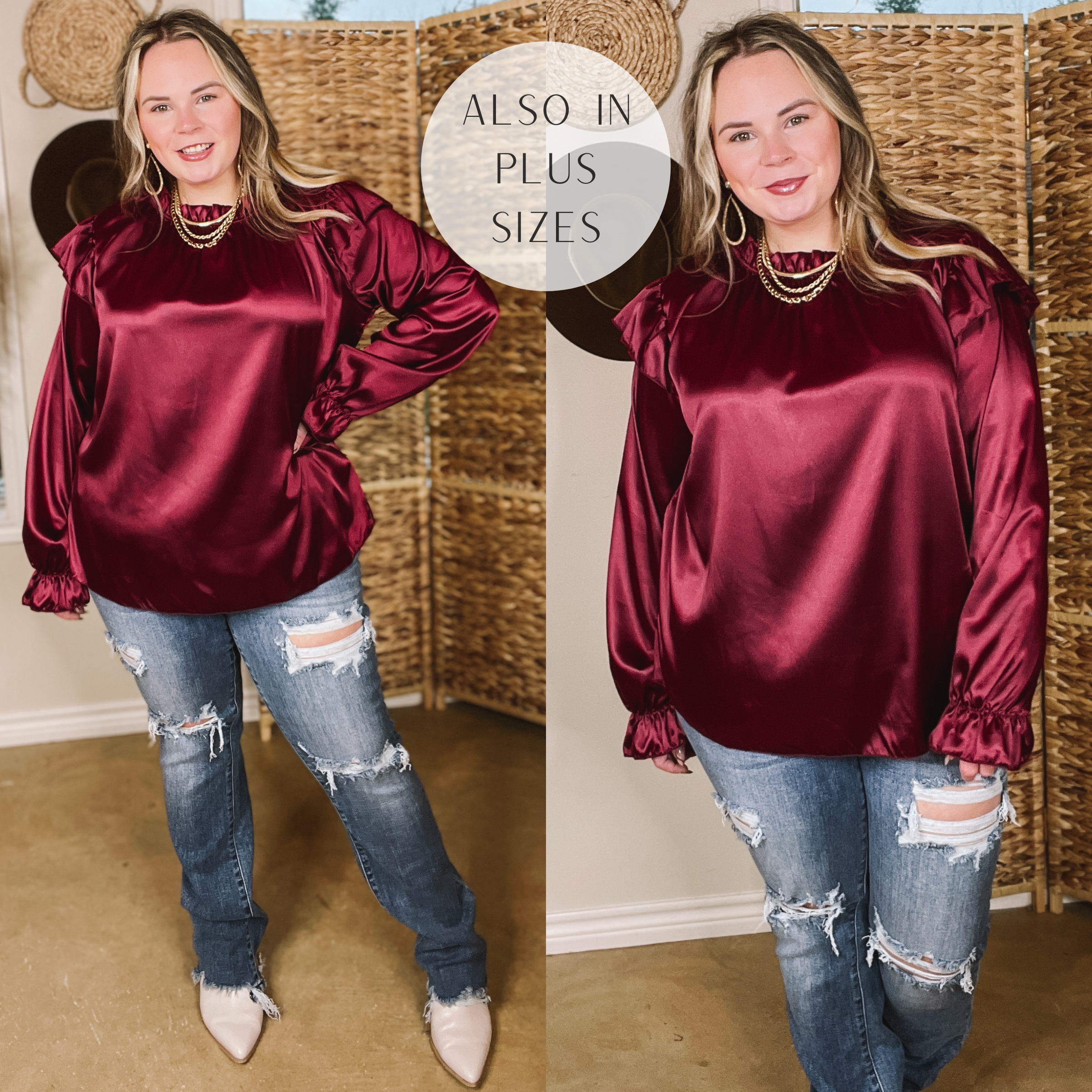 Model is wearing a maroon satin shirt with ruffles on the sleeves. Model is wearing white boties, distressed jeans, and has it paired with gold jewelry. 
