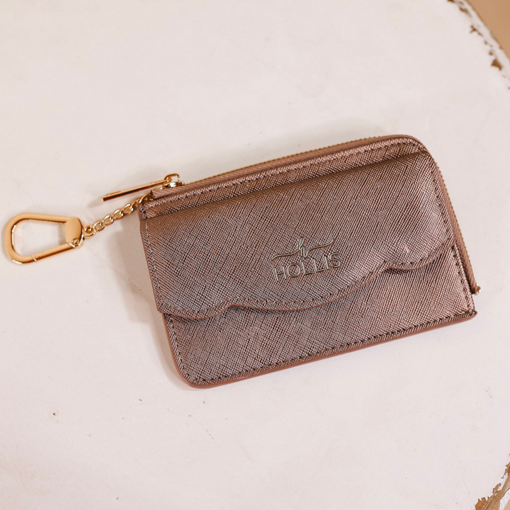 A card holder is laid in the center of the picture. Background is solid white. 