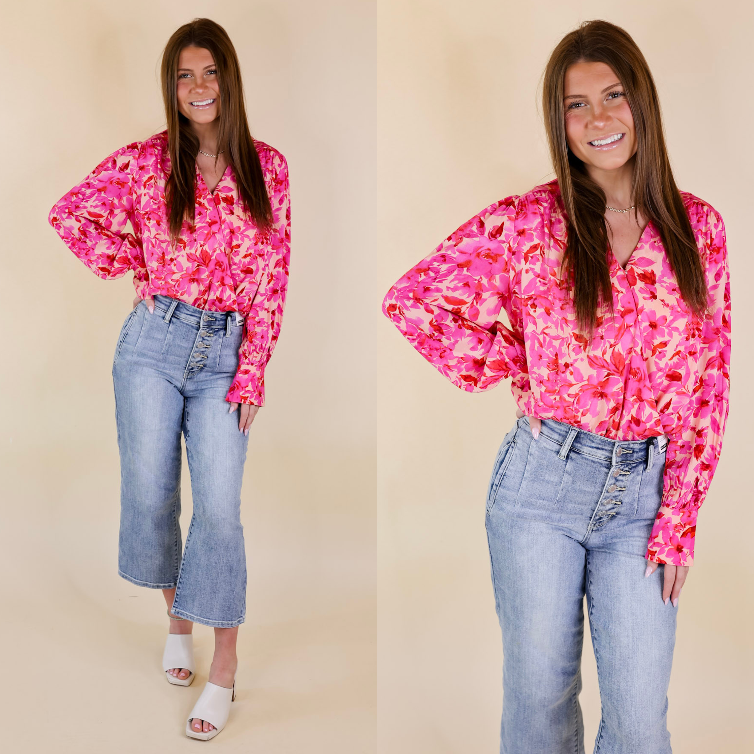 Model is wearing a long sleeve body suit in pink floral mix. Model has this body suit paired with jeans and white heels. 