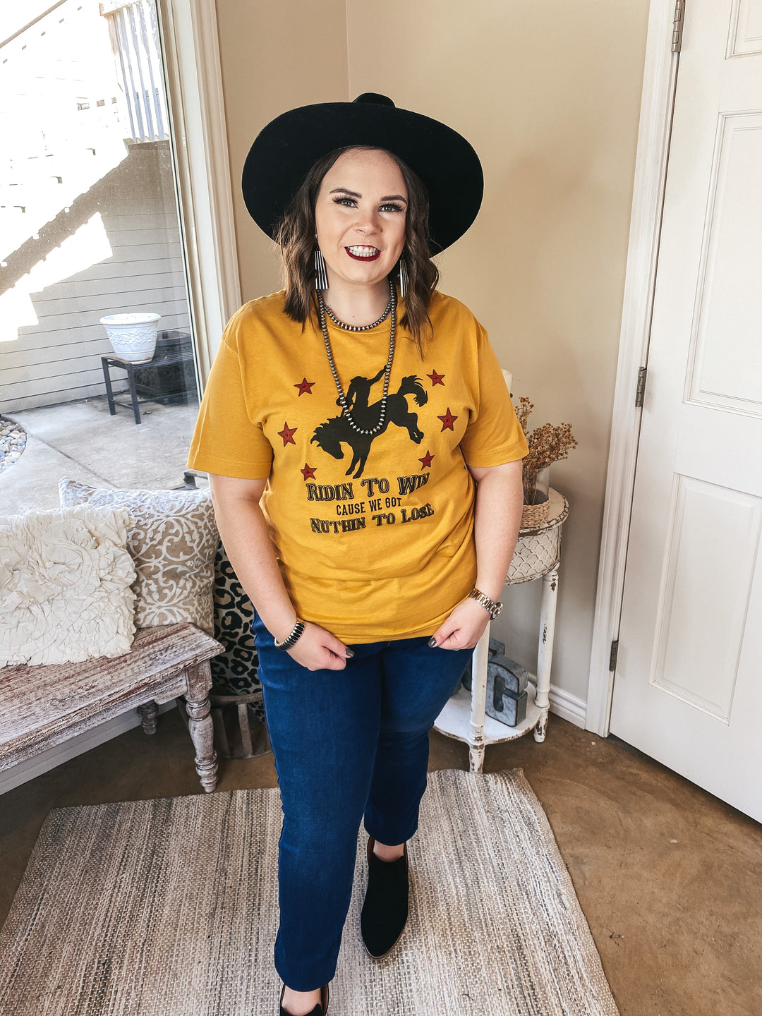 Ridin' To Win Bucking Horse Graphic Tee with Red Stars in Mustard Yellow - Giddy Up Glamour Boutique