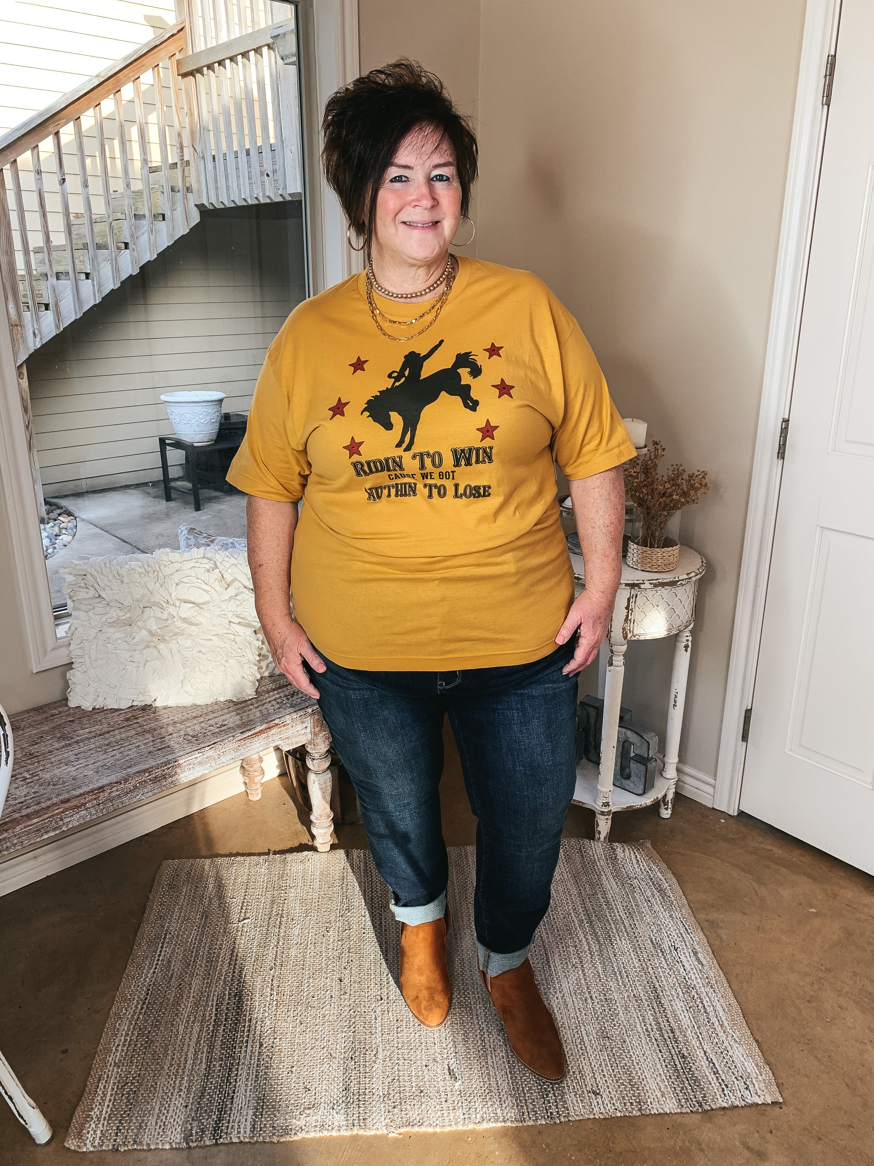 Ridin' To Win Bucking Horse Graphic Tee with Red Stars in Mustard Yellow - Giddy Up Glamour Boutique