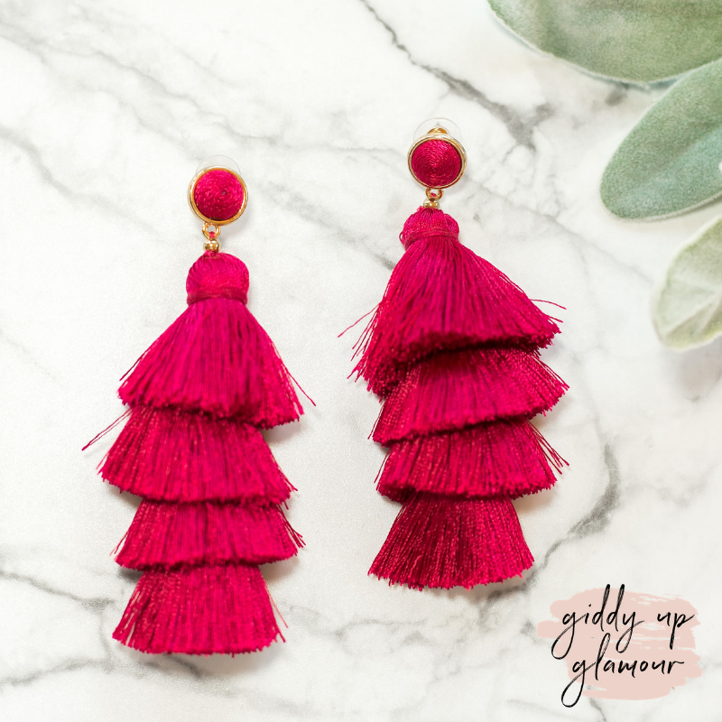 fun and flirty fast fashion long layered fringed tassel earrings with treaded top in raspberry fuschia pink on post back with gold accents