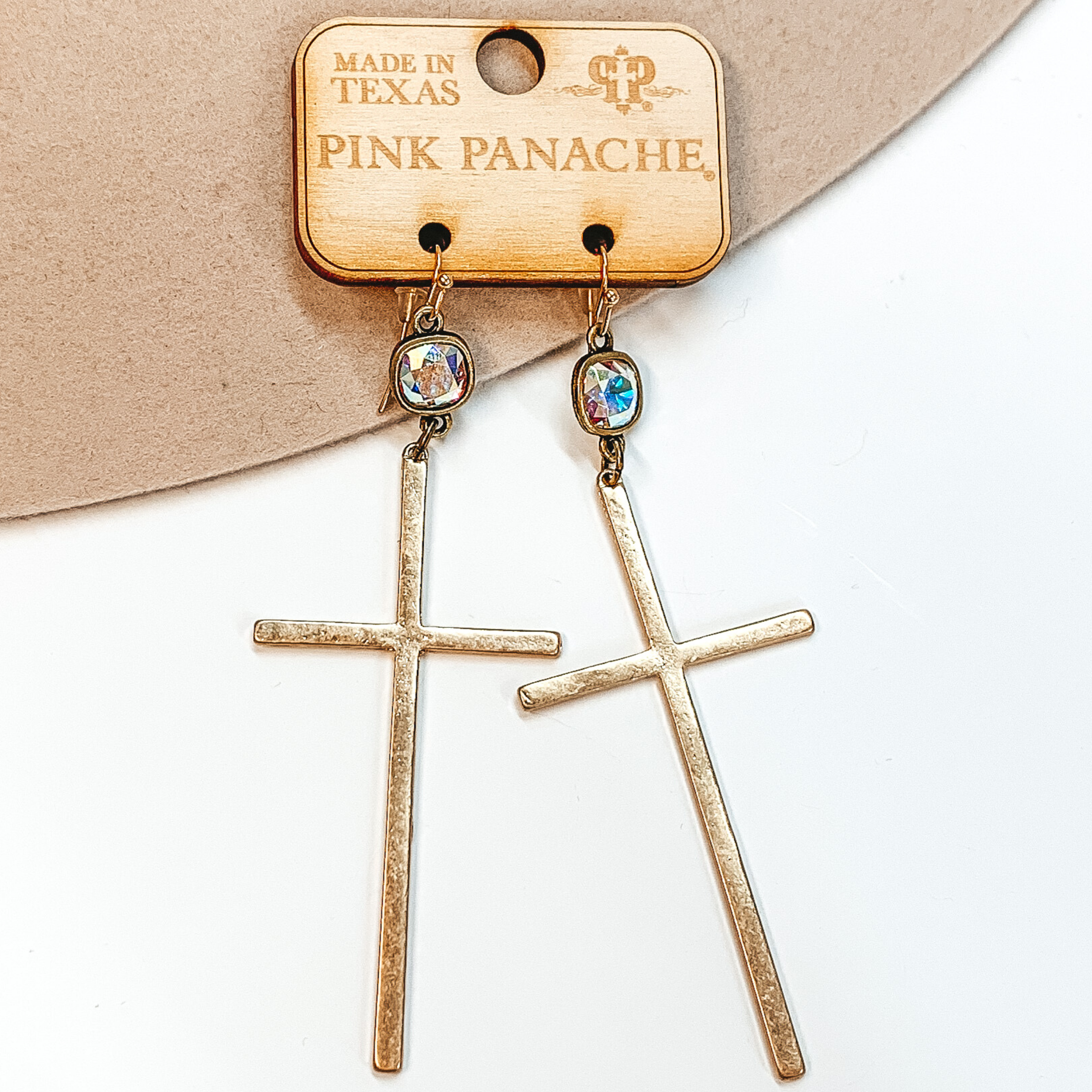 Pink Panache | AB Cushion Cut Earrings with Smooth Cross Pendant in Gold - Giddy Up Glamour Boutique