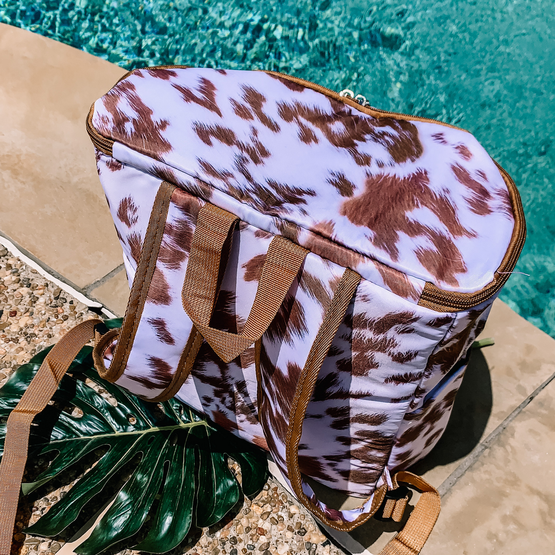 Here To Party Backpack Cooler in Cow Print - Giddy Up Glamour Boutique
