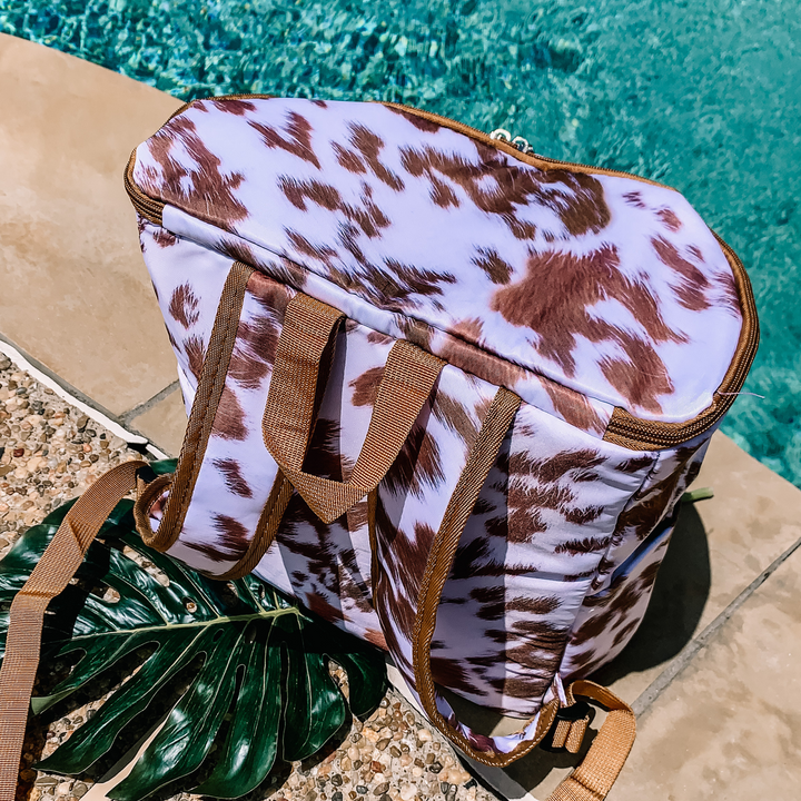 Here To Party Backpack Cooler in Cow Print - Giddy Up Glamour Boutique