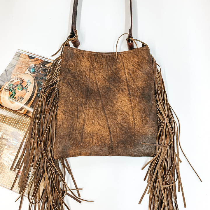 Keep It Gypsy | Hazel Bag in Turquoise Snake Print with Leather Fringe and Tooled Purse Strap - Giddy Up Glamour Boutique