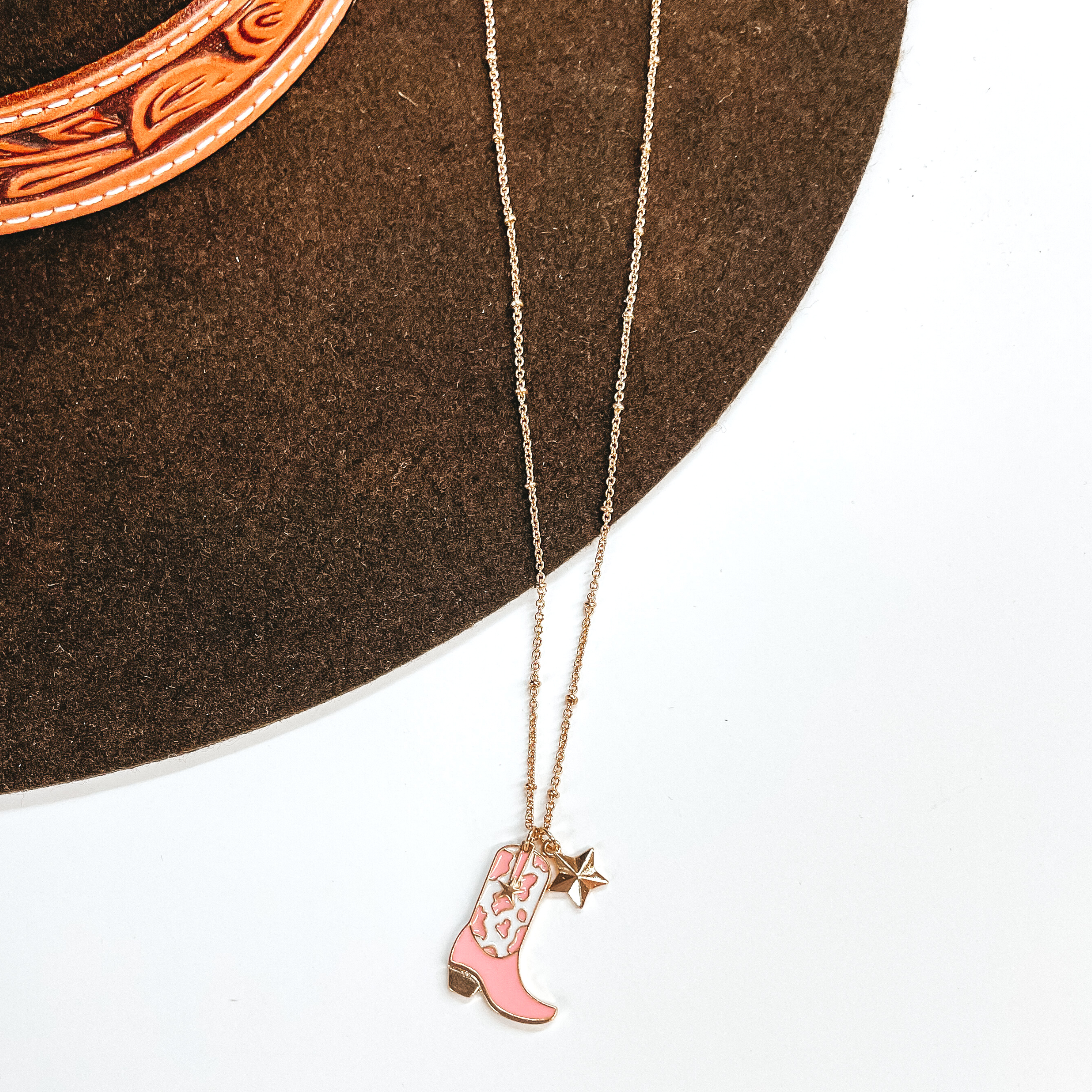 Kick Your Boots Up Gold Necklace with Cow Print Boot Pendant in White and Pink - Giddy Up Glamour Boutique