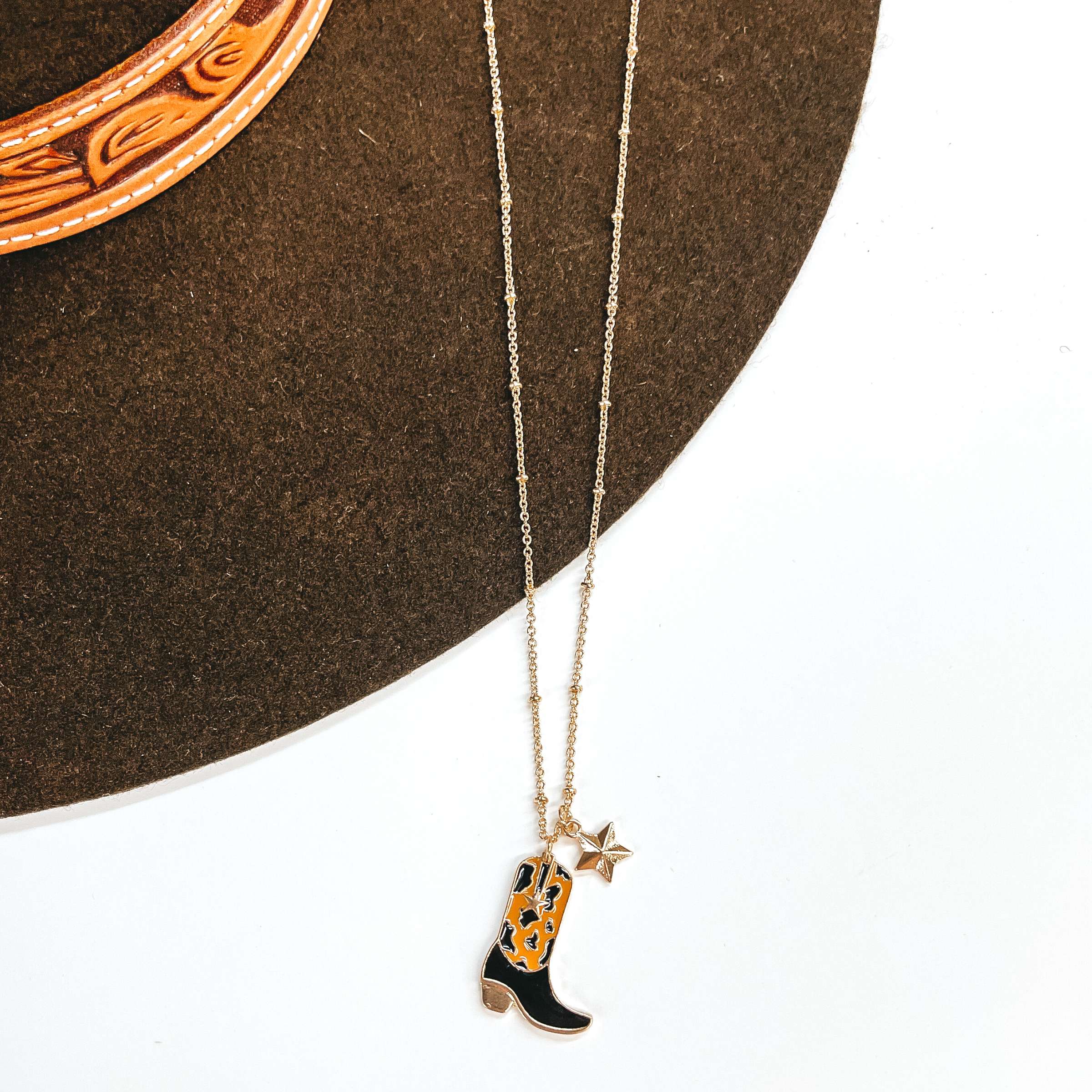 Kick Your Boots Up Gold Necklace with Cow Print Boot Pendant in Brown and Black - Giddy Up Glamour Boutique