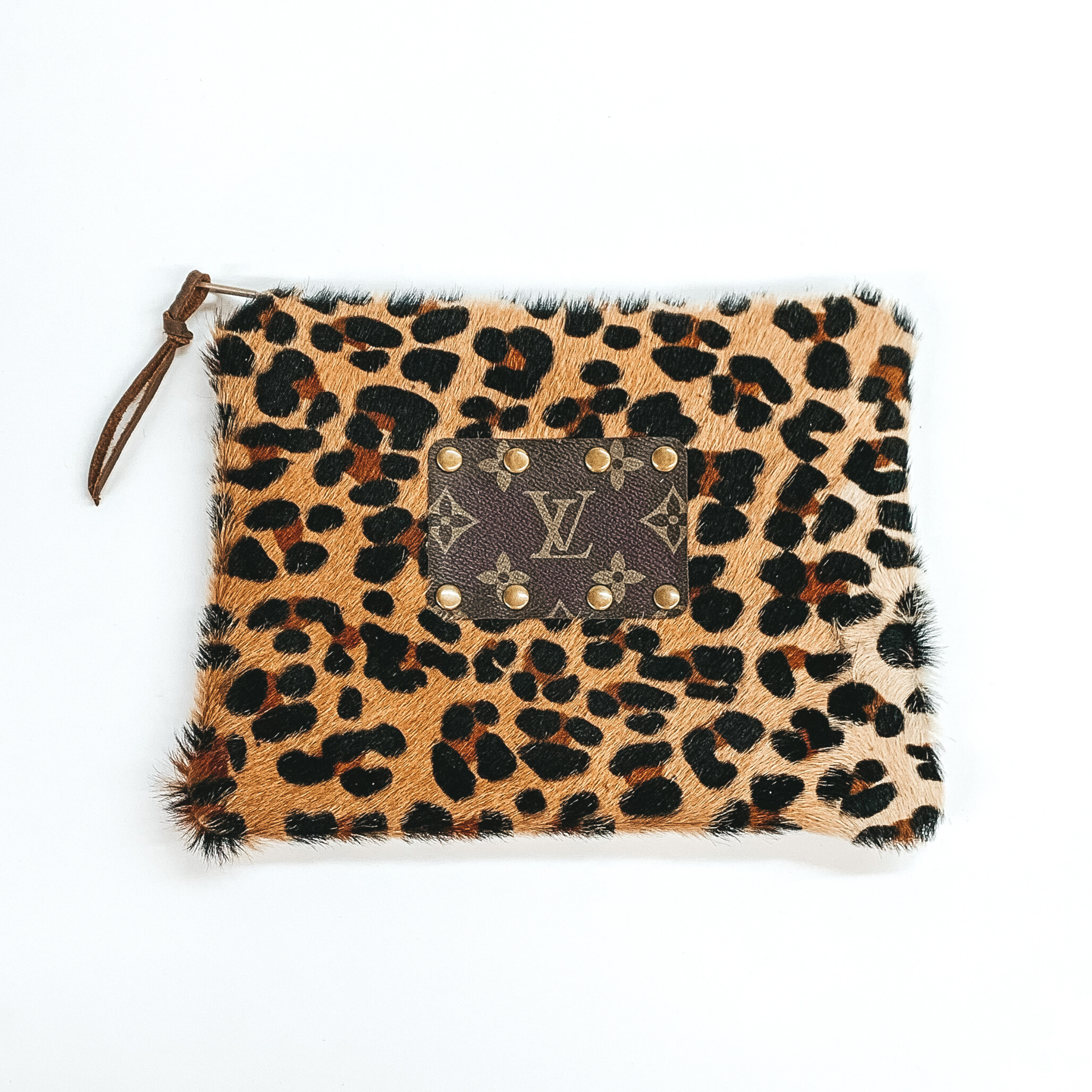 Keep It Gypsy | Leopard Print Cowhide Make Up Bag with a Leather Embellishment - Giddy Up Glamour Boutique