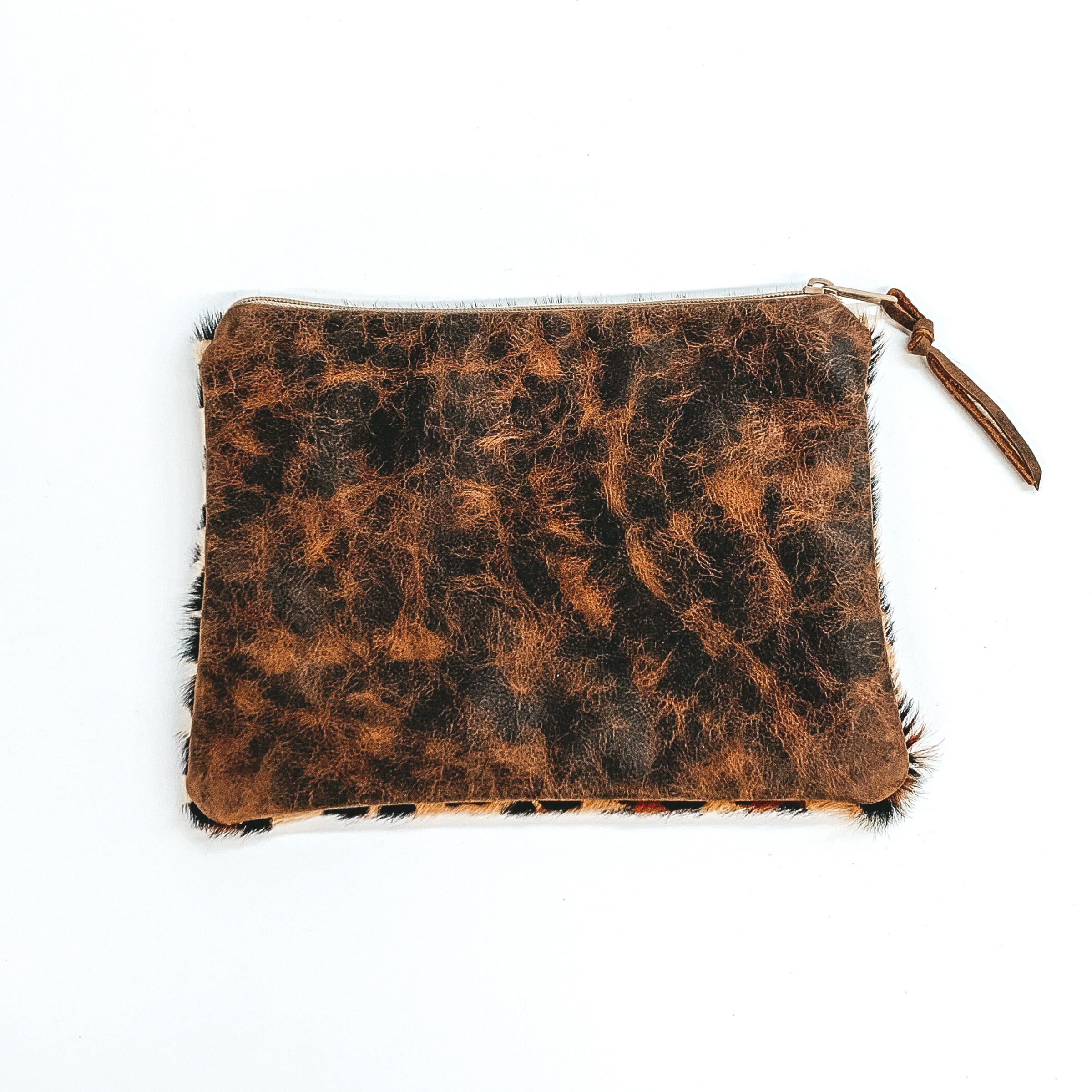 Keep It Gypsy | Leopard Print Cowhide Make Up Bag with a Leather Embellishment - Giddy Up Glamour Boutique