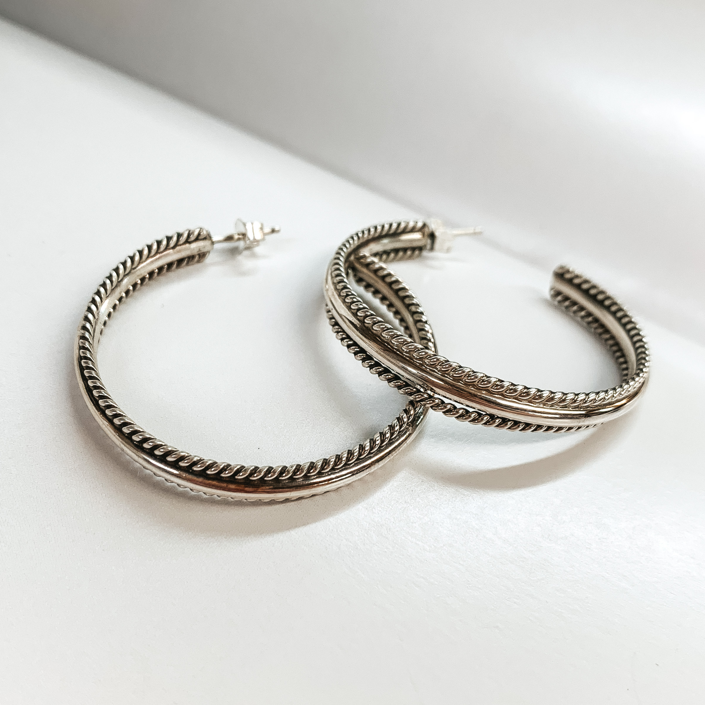 Navajo | Navajo Handmade Sterling Silver Hoop Earrings with a Rope Detailing Outline - Giddy Up Glamour Boutique