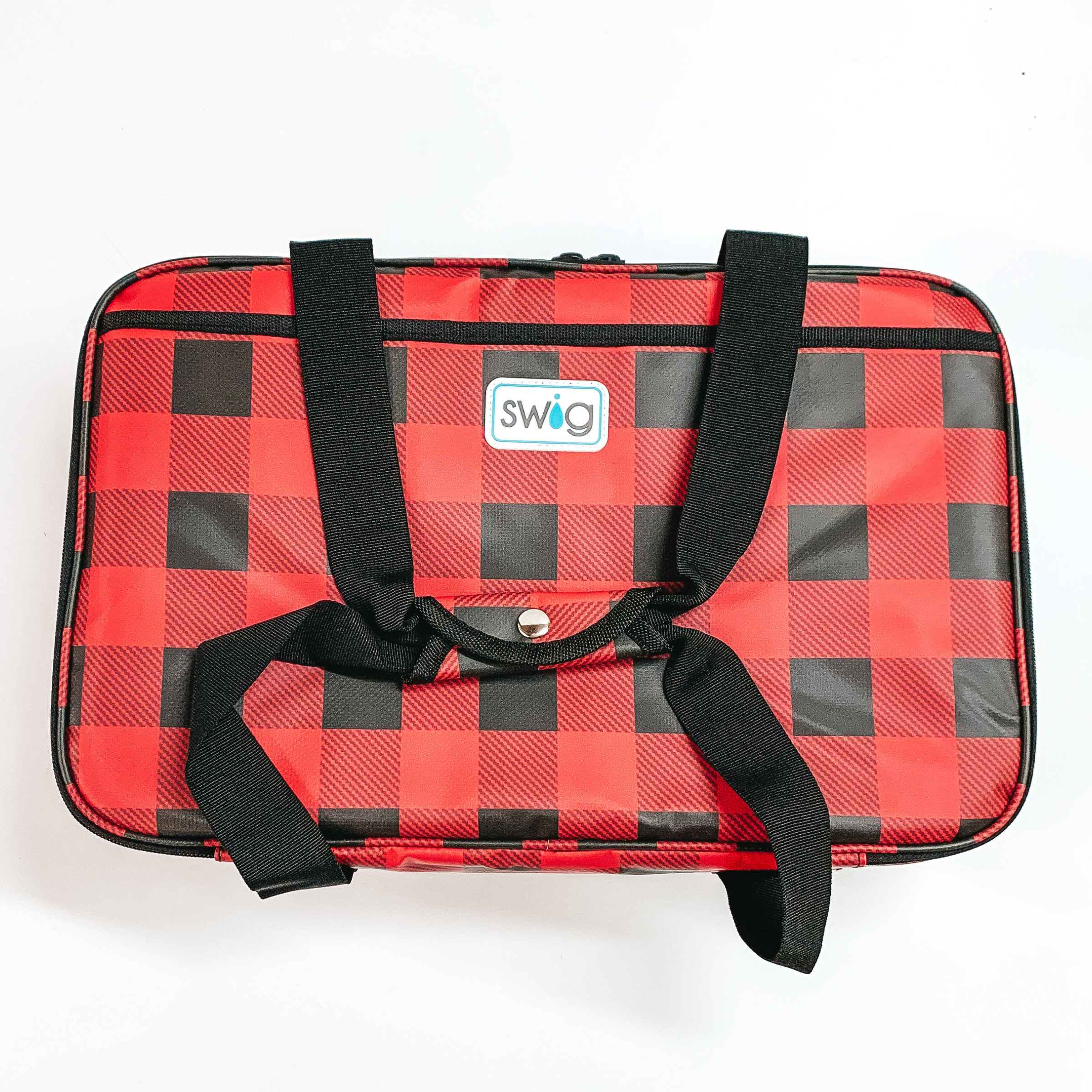 Red and black buffalo plaid casserole carrier with black handles. This carrier is pictured on a white background. 
