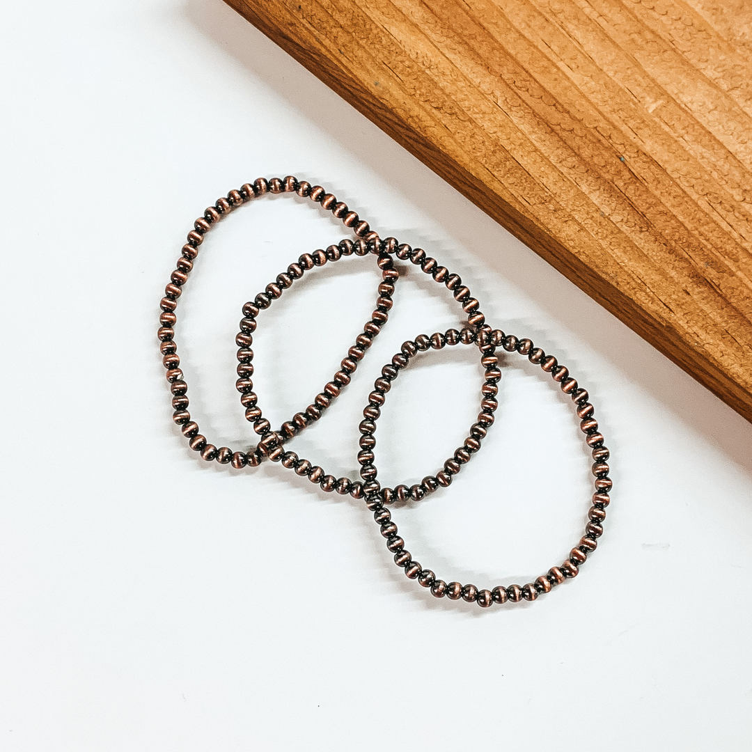 Set of Three Faux Navajo Pearl 4mm Bracelets in Copper Tone - Giddy Up Glamour Boutique