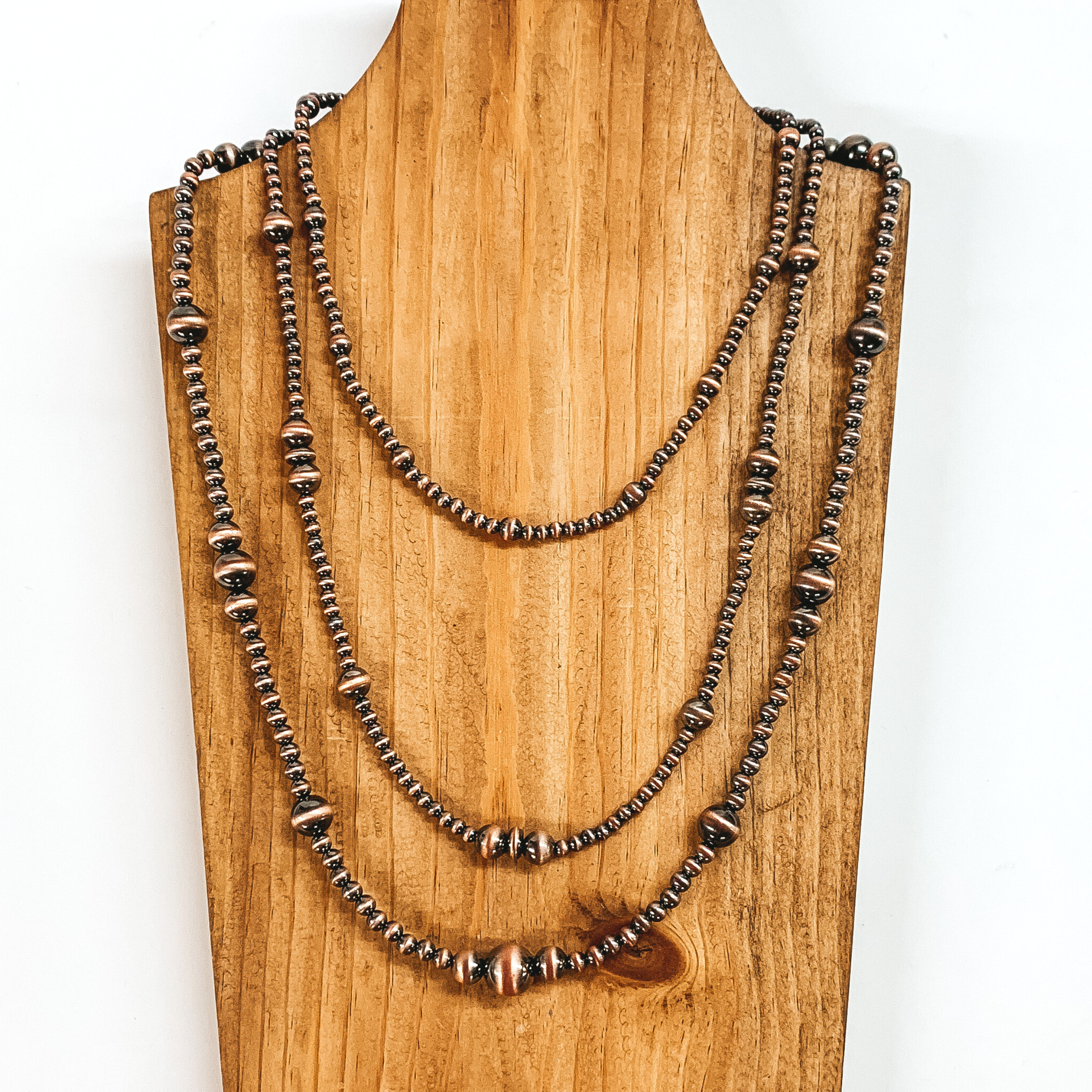 Three Strand Necklace of Faux Navajo Pearls with Graduated Pearls in Copper Tone - Giddy Up Glamour Boutique