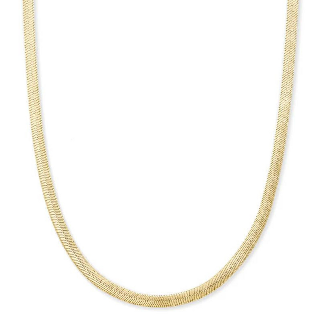 Gold herringbone chain necklace pictured on a white background. 