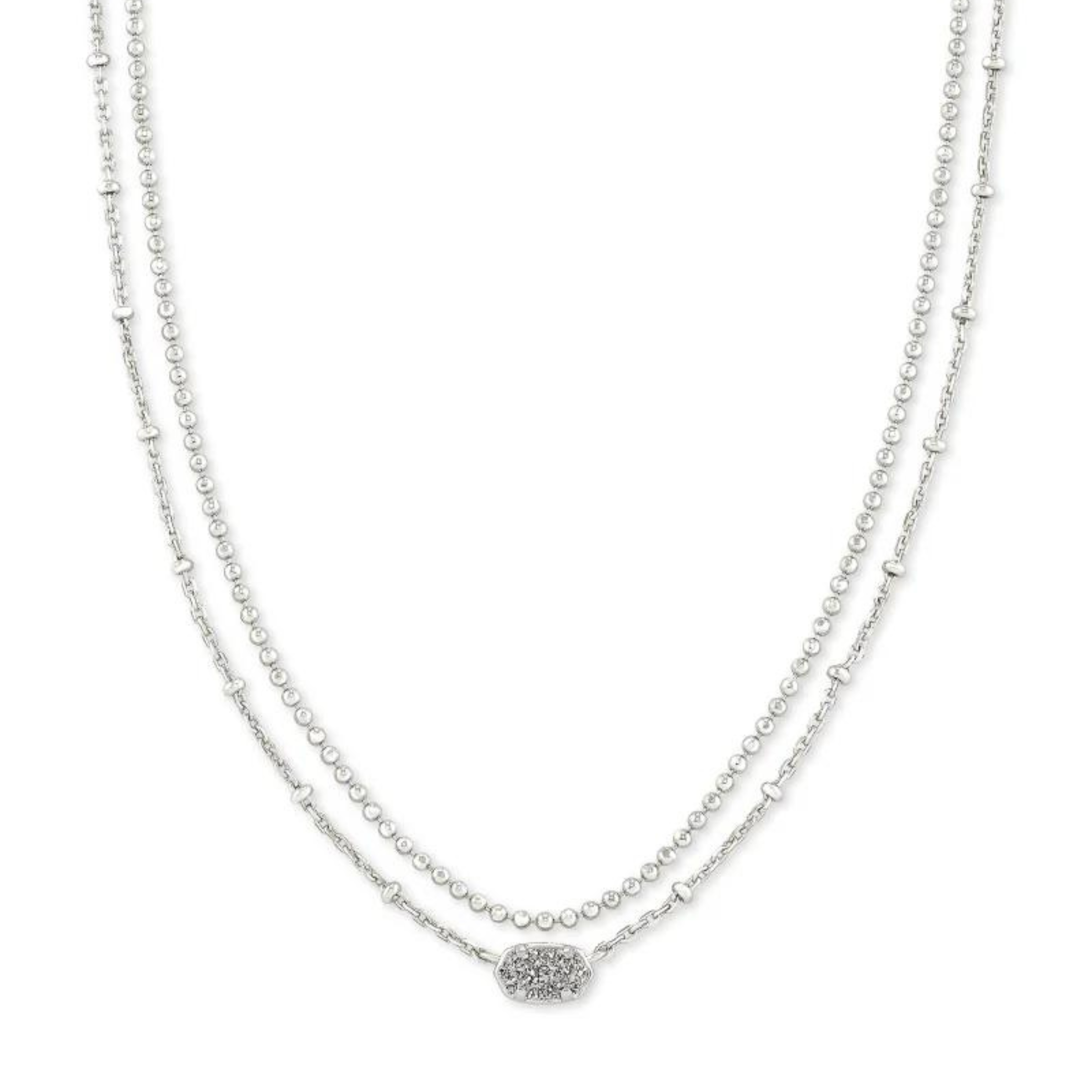 Thin, double silver necklace with small, oval drusy pendant pictured on a white background. 