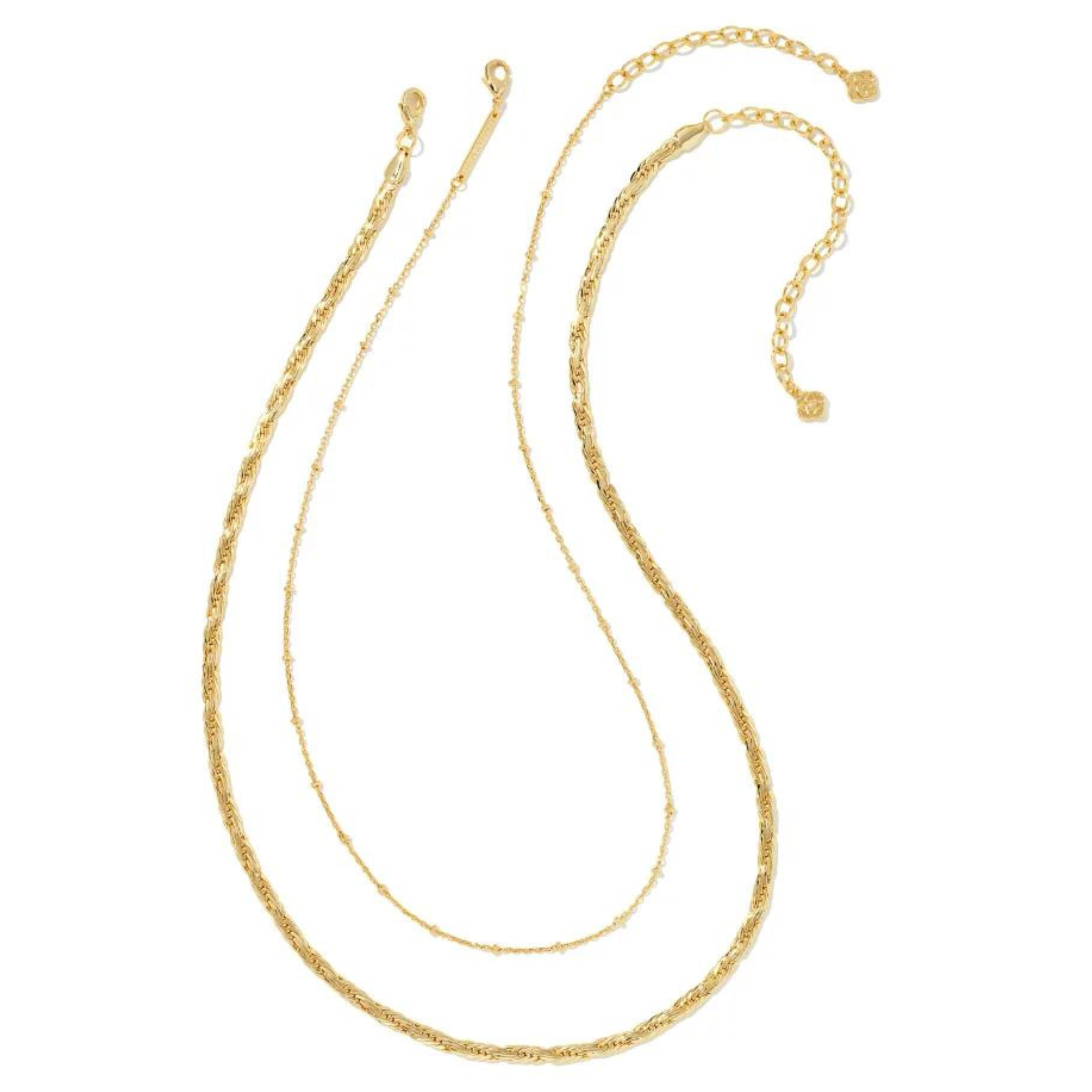 Two gold chain necklaces pictured on a white background. 