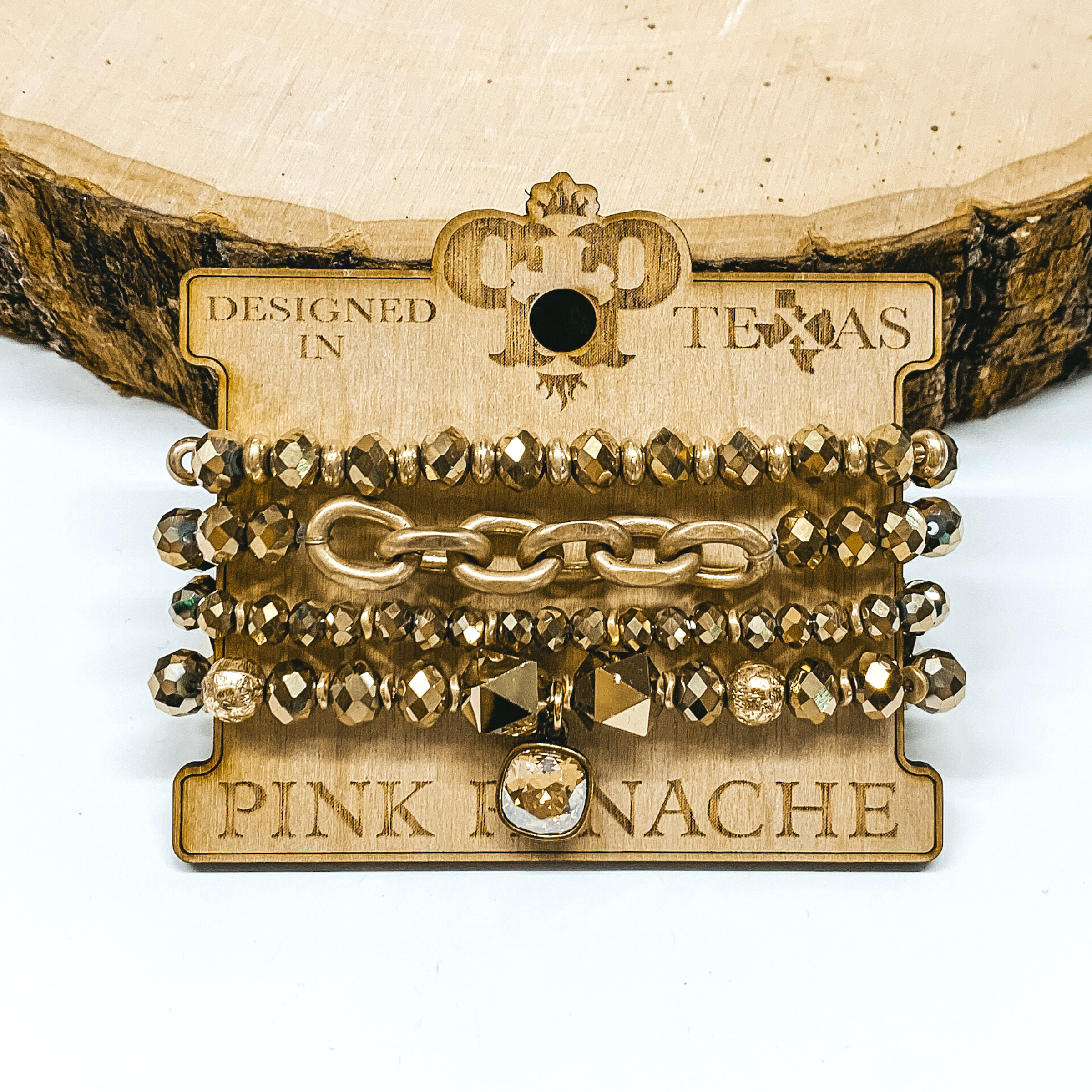 Pink Panache | Bronze Metallic Crystal and Gold Tone Beaded Bracelet Set with Gold Tone Chain Segment and Golden Shadow Cushion Cut Crystal Pendant