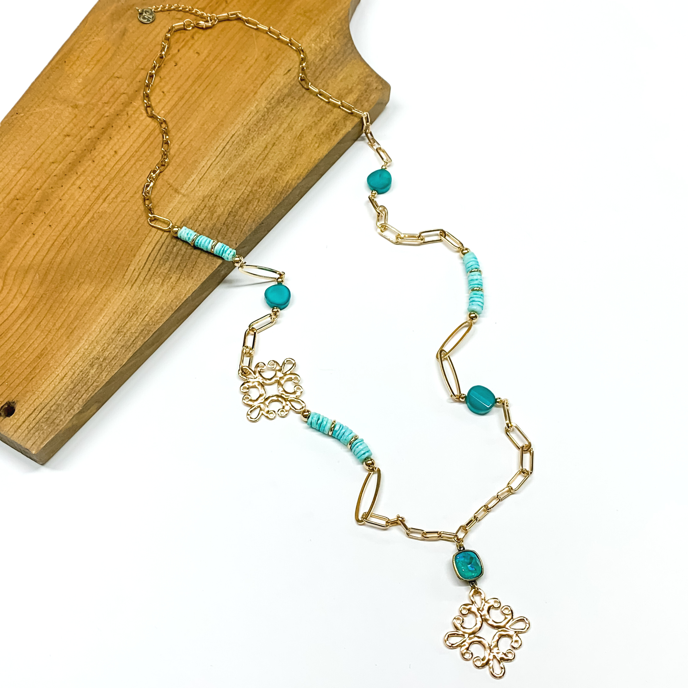 Pink Panache | Long Gold Tone Paperclip Chain and Turquoise Beaded Necklace with Laguna Delight Cushion Cut Crystal and Gold Tone Quatrefoil Drop - Giddy Up Glamour Boutique
