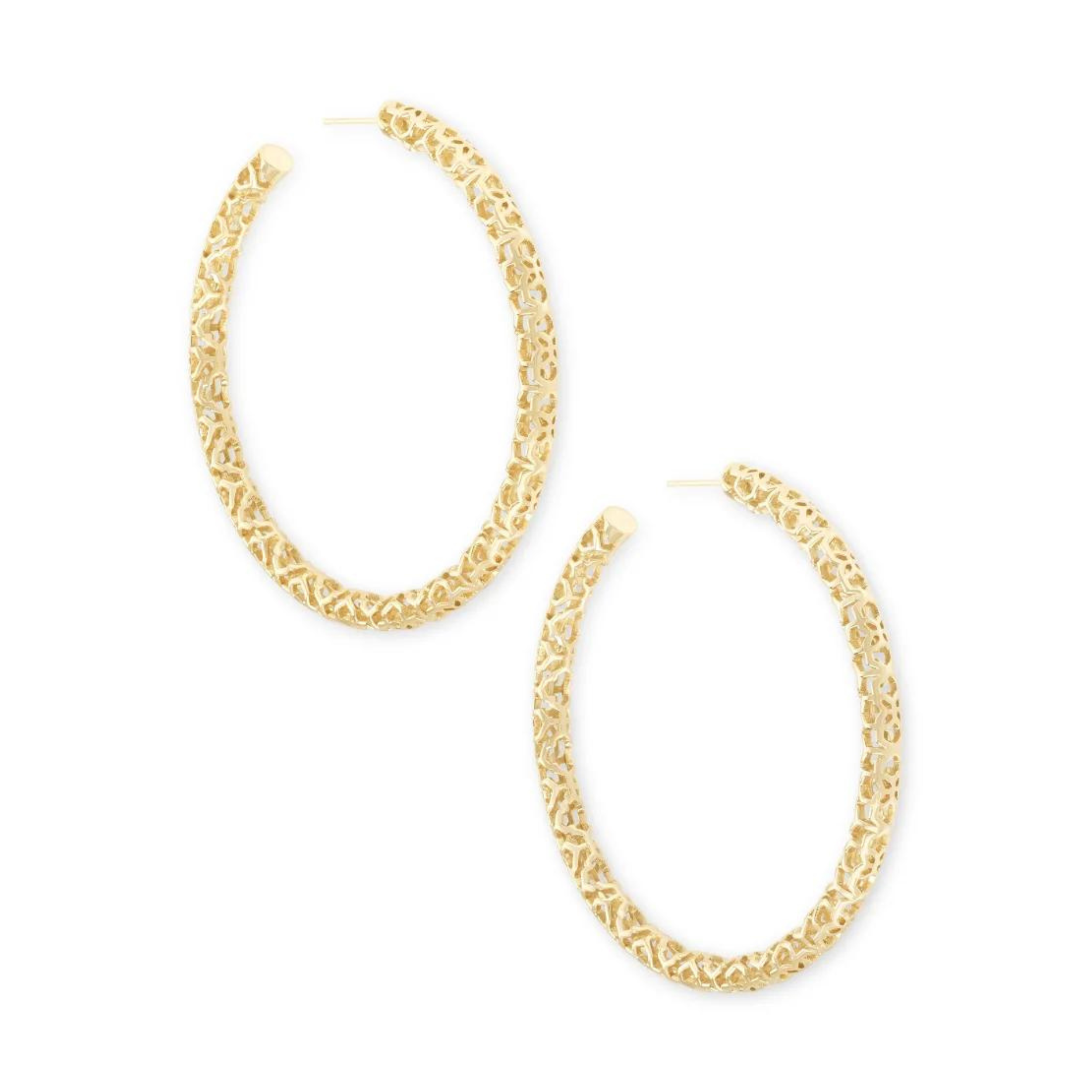 Large gold hoop earrings with filigree detaling.