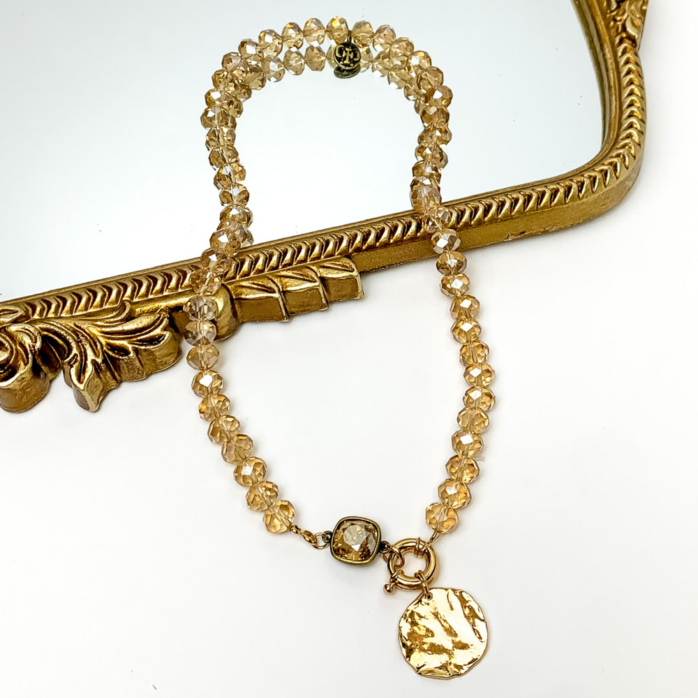 Pink Panache | Golden Shadow Crystal Beaded Necklace with Gold Tone Coin Charm and Golden Shadow Cushion Cut Crystal - Giddy Up Glamour Boutique