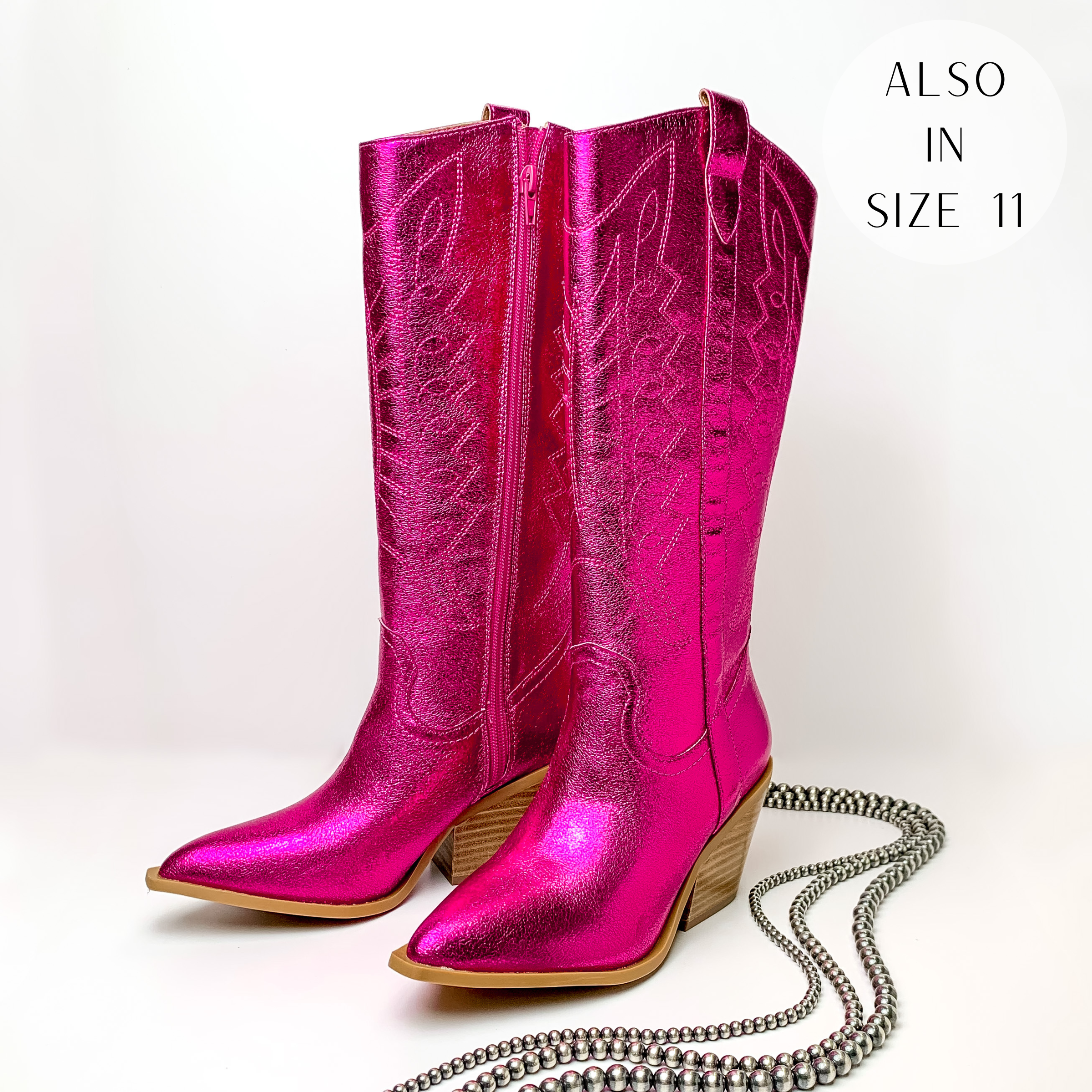 Metallic fuchsia cowboy boots with fuchsia western stitching and tan heel. These boots are pictured on a white background with silver beads on the right side of the boots.