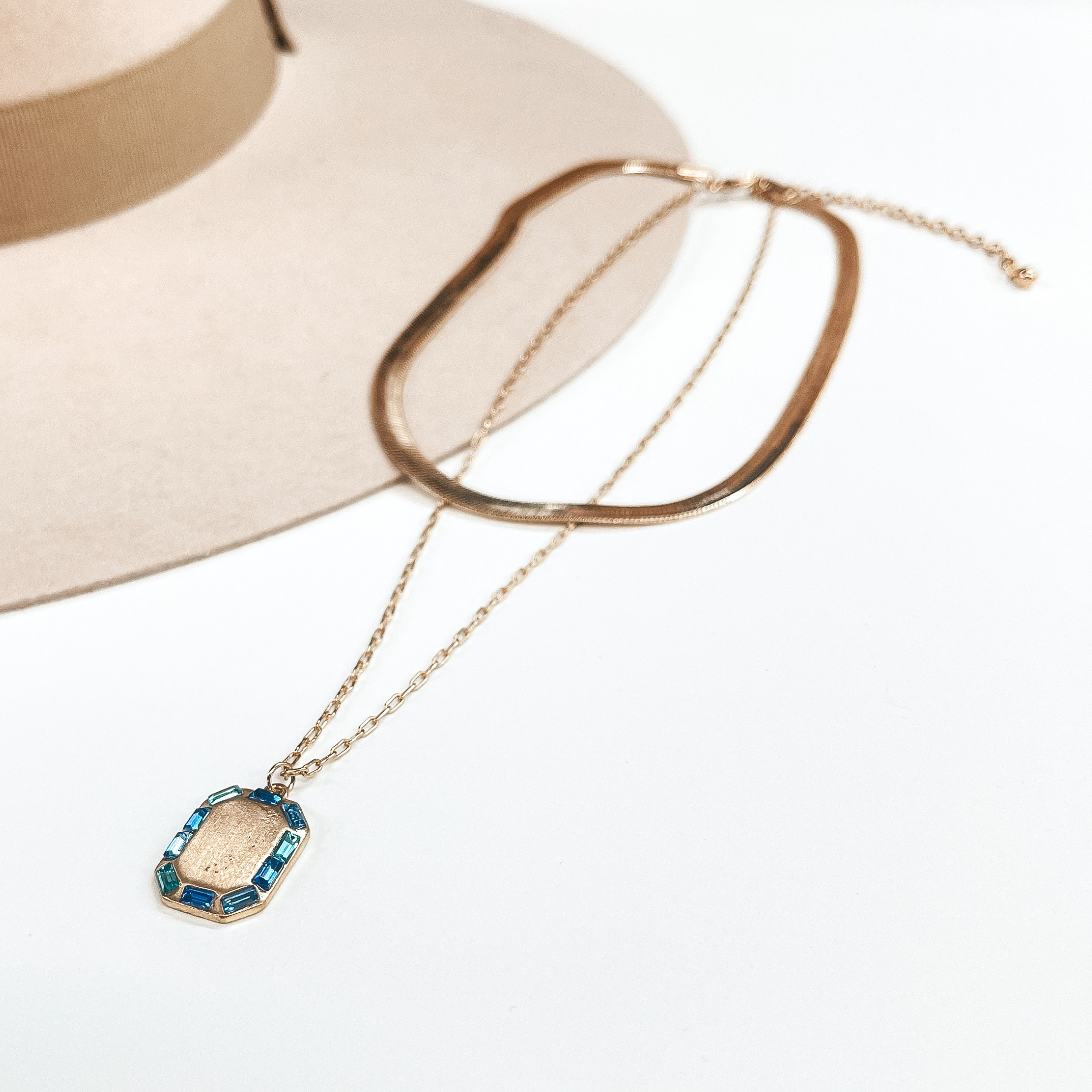 Made For Royalty Herringbone Chain and Gold Tone Necklace with Rectangular Pendant in Blue - Giddy Up Glamour Boutique