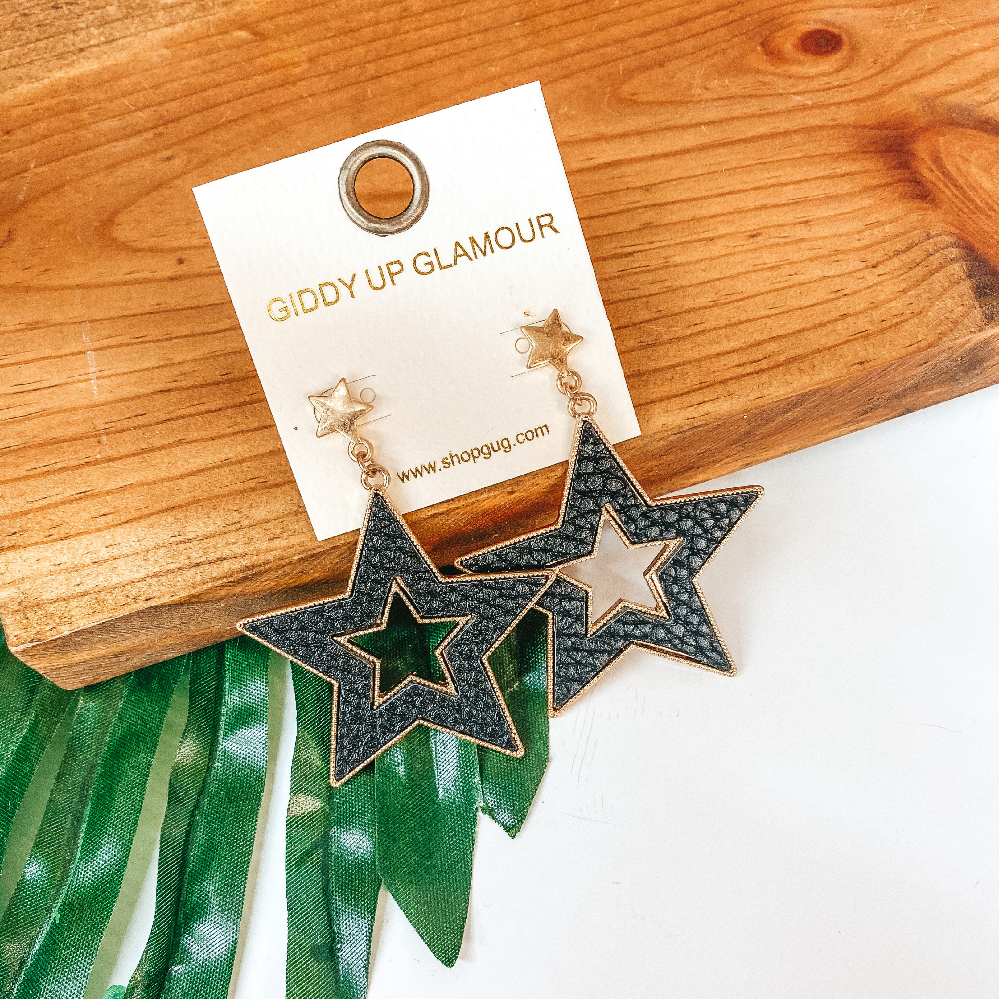 She's a Star Gold Post Dangle Earrings with Leather Star in Black - Giddy Up Glamour Boutique